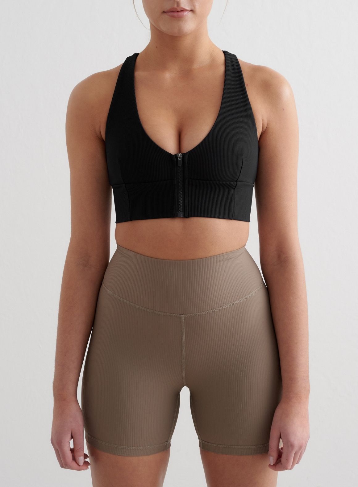 High-Performance Black Ribbed Zip-Up Sports Bra for Women - Perfect for Running, Yoga & Gym Workouts