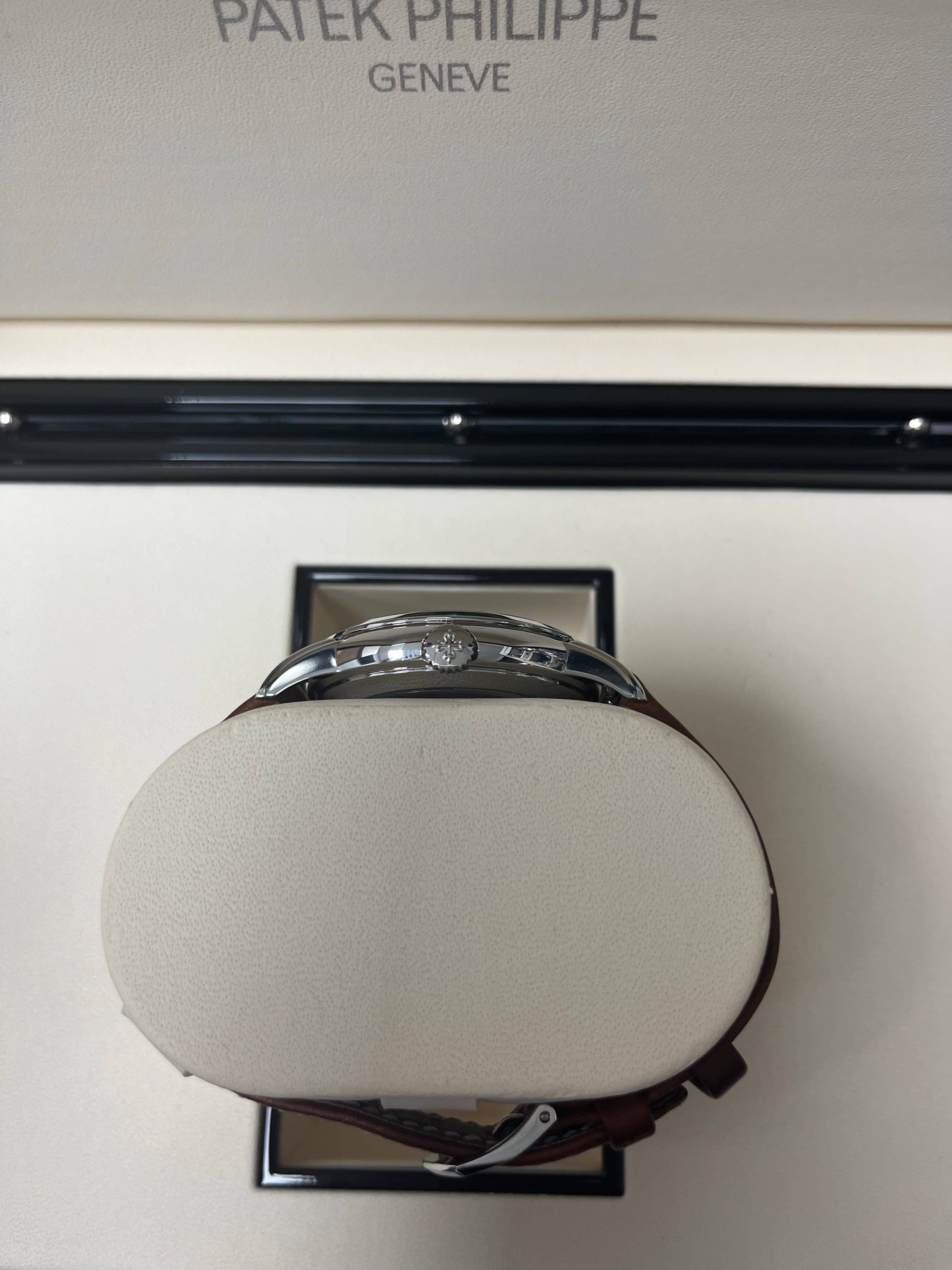 Patek Philippe Calatrava 5212A-001 Automatic Watch with Weekly Calendar - Silvery Opaline Dial, Stainless Steel Case - Luxury Dress Watch for Business & Formal Occasions