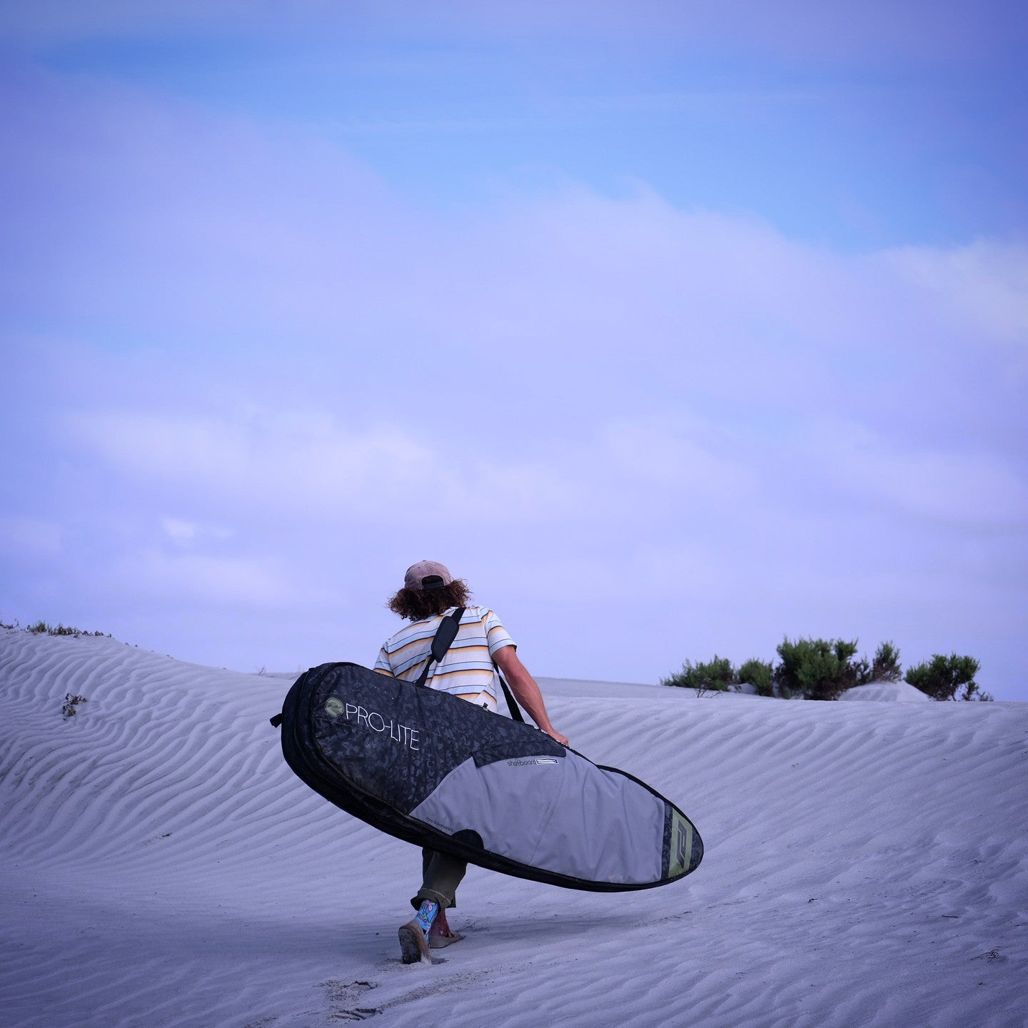 **Rhino Pro Lite Travel Surfboard Bag 6'0 to 7'6 - Waterproof & Padded Protection for 1-2 Boards (Fish/Hybrid/Big Short) - Perfect for Surf Trips & Air Travel**