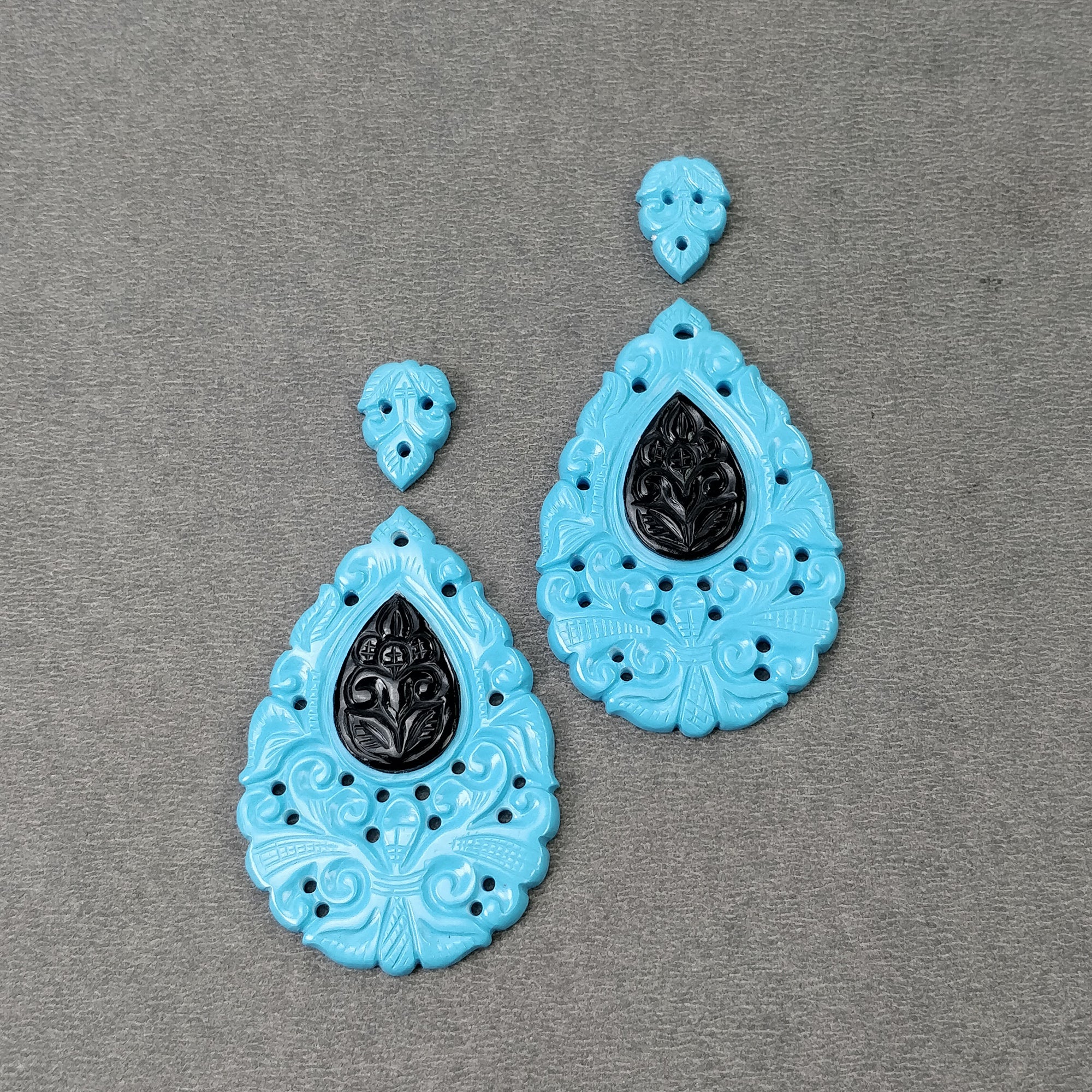 68.35cts Synthetic Sleeping Beauty Turquoise & Black Onyx Pear-Shaped Gemstone Carving - 14x9mm (48x32mm 4pcs) - Handcrafted Jewelry Making Supplies for Necklaces, Bracelets & DIY Crafts