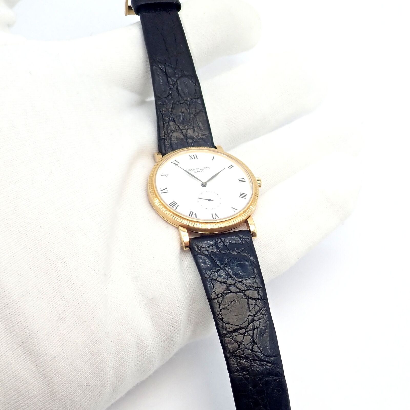 Patek Philippe Calatrava 18k Yellow Gold Men's Watch with Roman Dial - Manual Wind Luxury Dress Watch for Formal Events & Business Occasions
