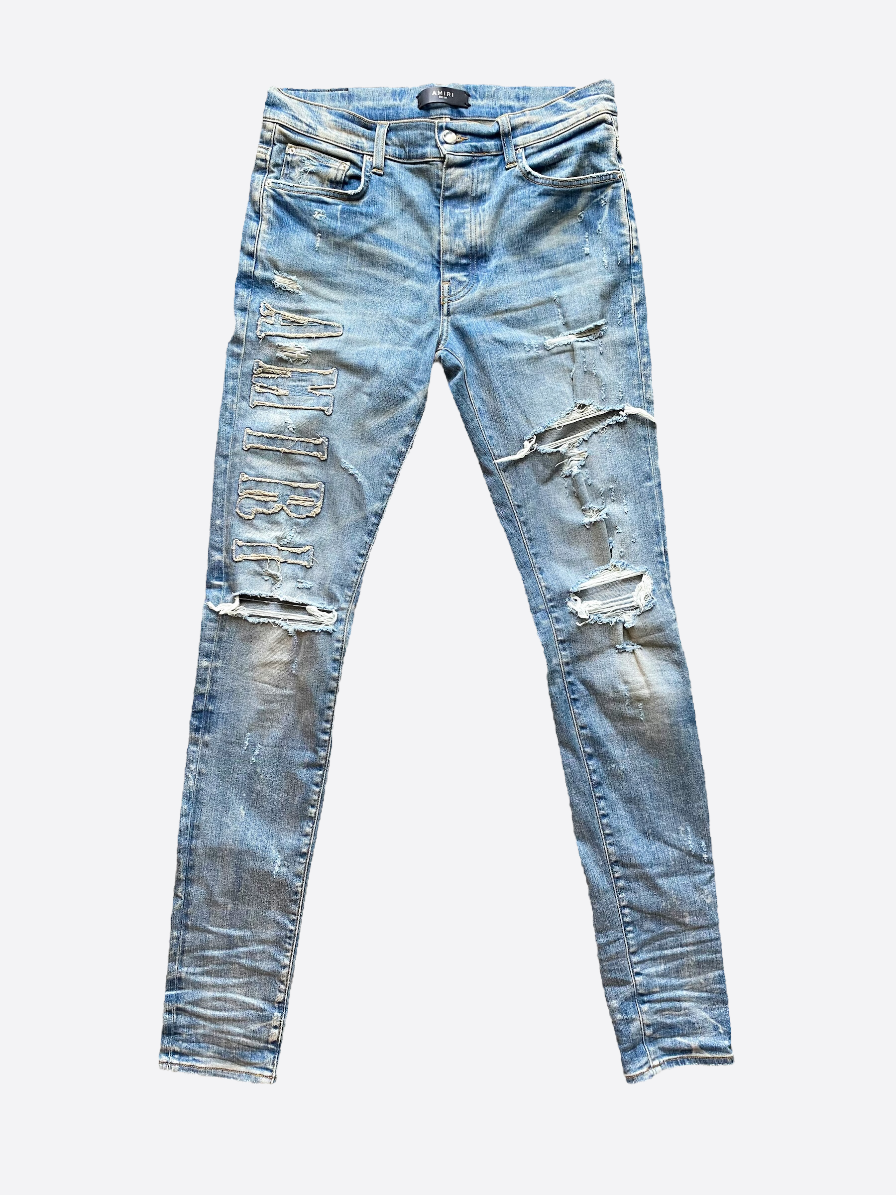 Amiri Logo Applique Blue Distressed Denim Jeans for Men - Stylish Vintage Washed Slim Fit Designer Jeans | Perfect for Casual Wear, Night Out and Street Fashion