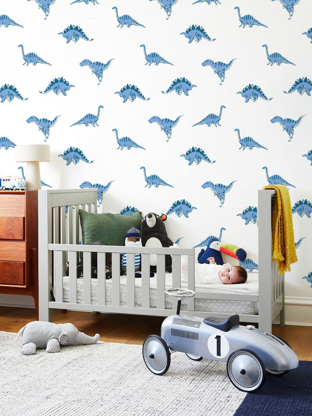 El Dorado Dinos Wallpaper by Tea Collection - Blue Dinosaur Themed Wallpaper for Kids Room Decor & Nursery Design