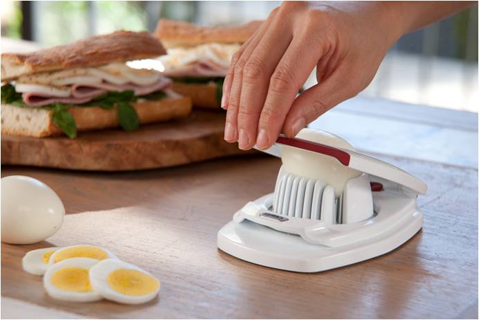 Zyliss Egg Cutter - Non-Slip Stainless Steel Egg Slicer & Wedger with Built-in Shell Piercer - Perfect for Salads, Sandwiches, and Breakfast Meal Prep