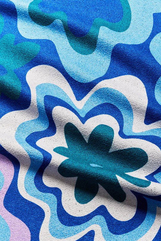 Nomadix Original Towel - Quick Dry, Lightweight & Absorbent Travel Beach Towel with Groovy Blue Green Flower Design | Perfect for Pool, Yoga, Gym & Outdoor Adventures