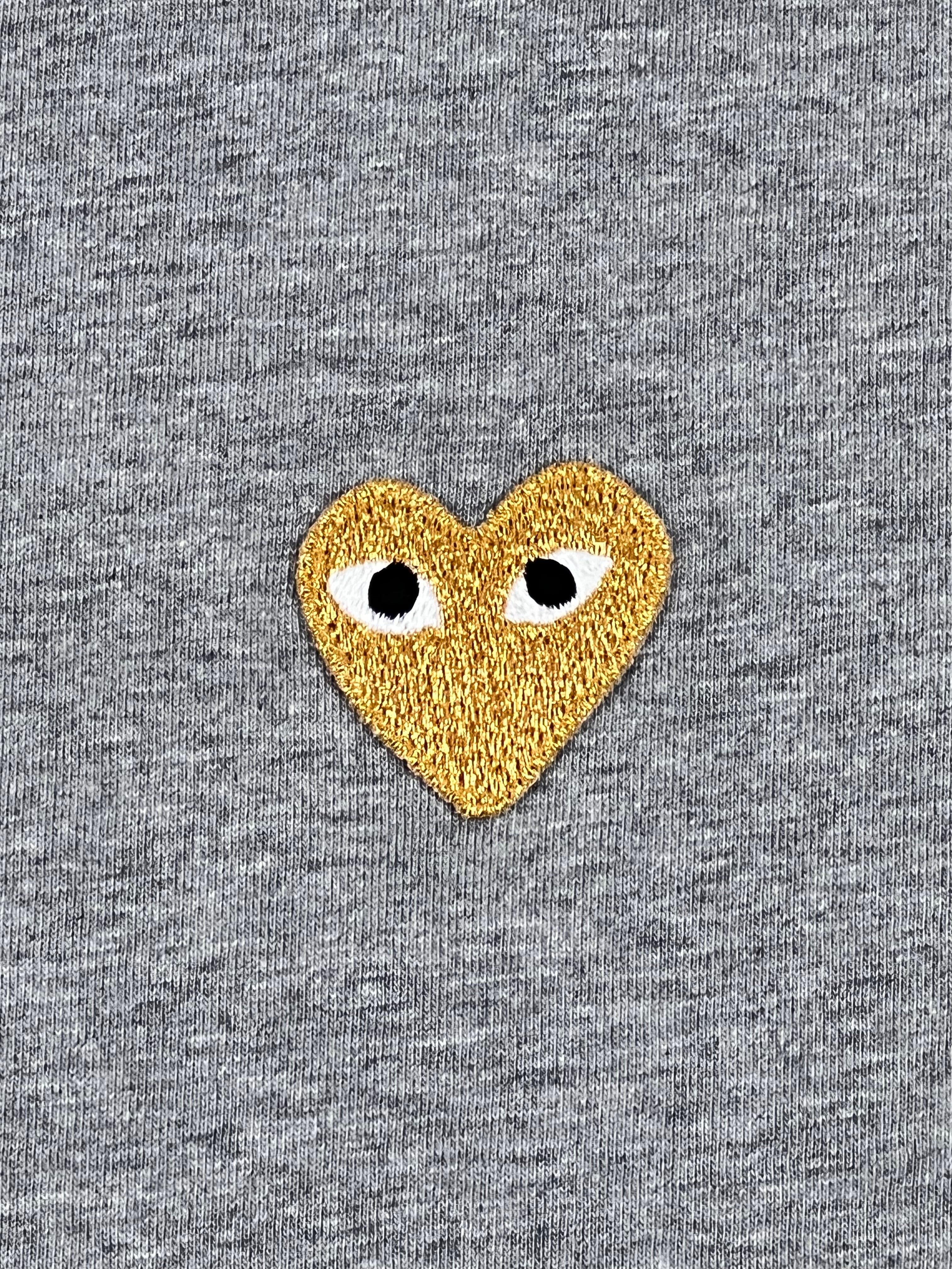 Comme Des Garcons Play T-Shirt with Gold Heart Print in Grey - Stylish Casual Wear for Men & Women | Perfect for Streetwear, Dating & Everyday Fashion