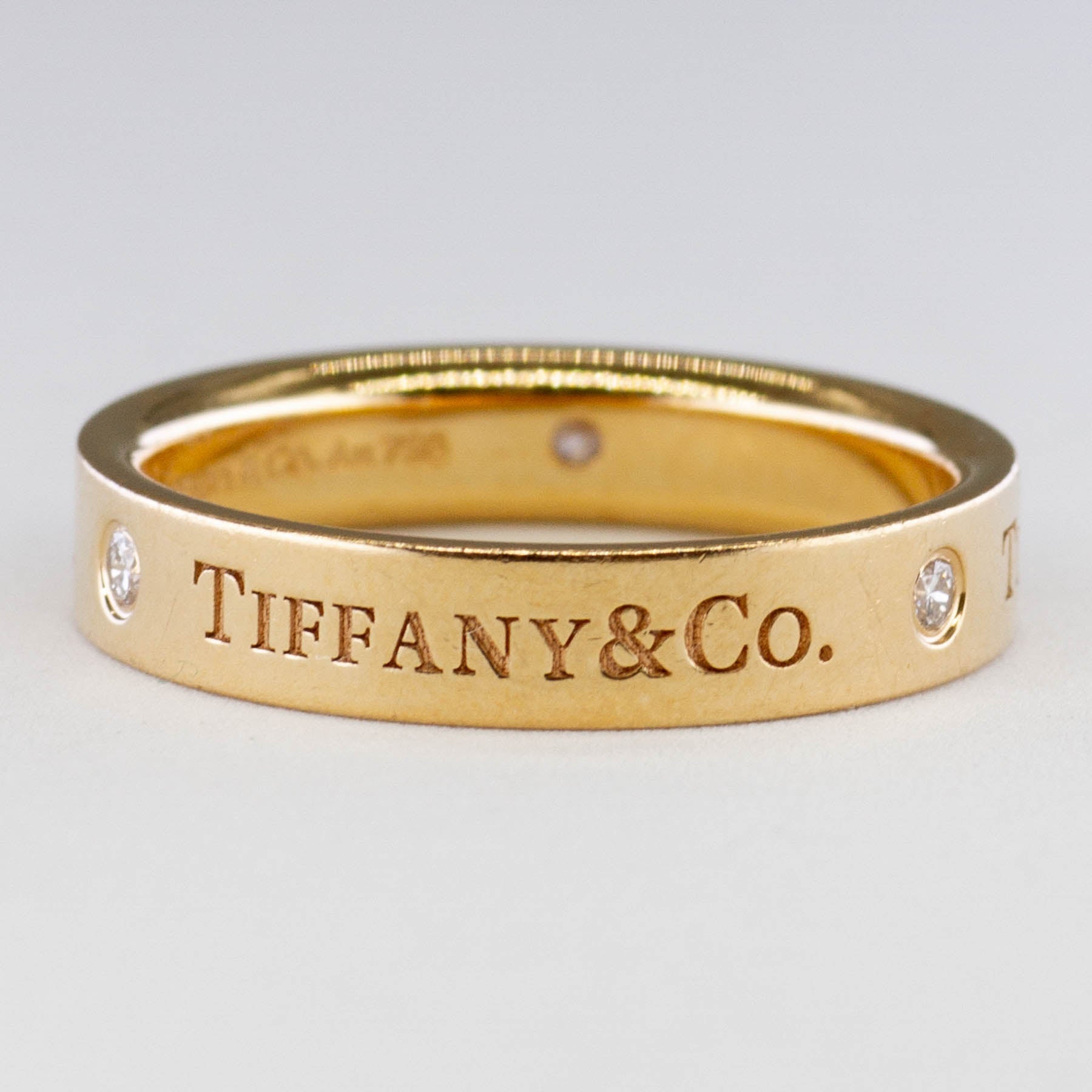 Tiffany & Co. 0.09ctw Diamond Band Ring Size 7.5 - Elegant Wedding Band, Anniversary Gift, or Everyday Jewelry for Women