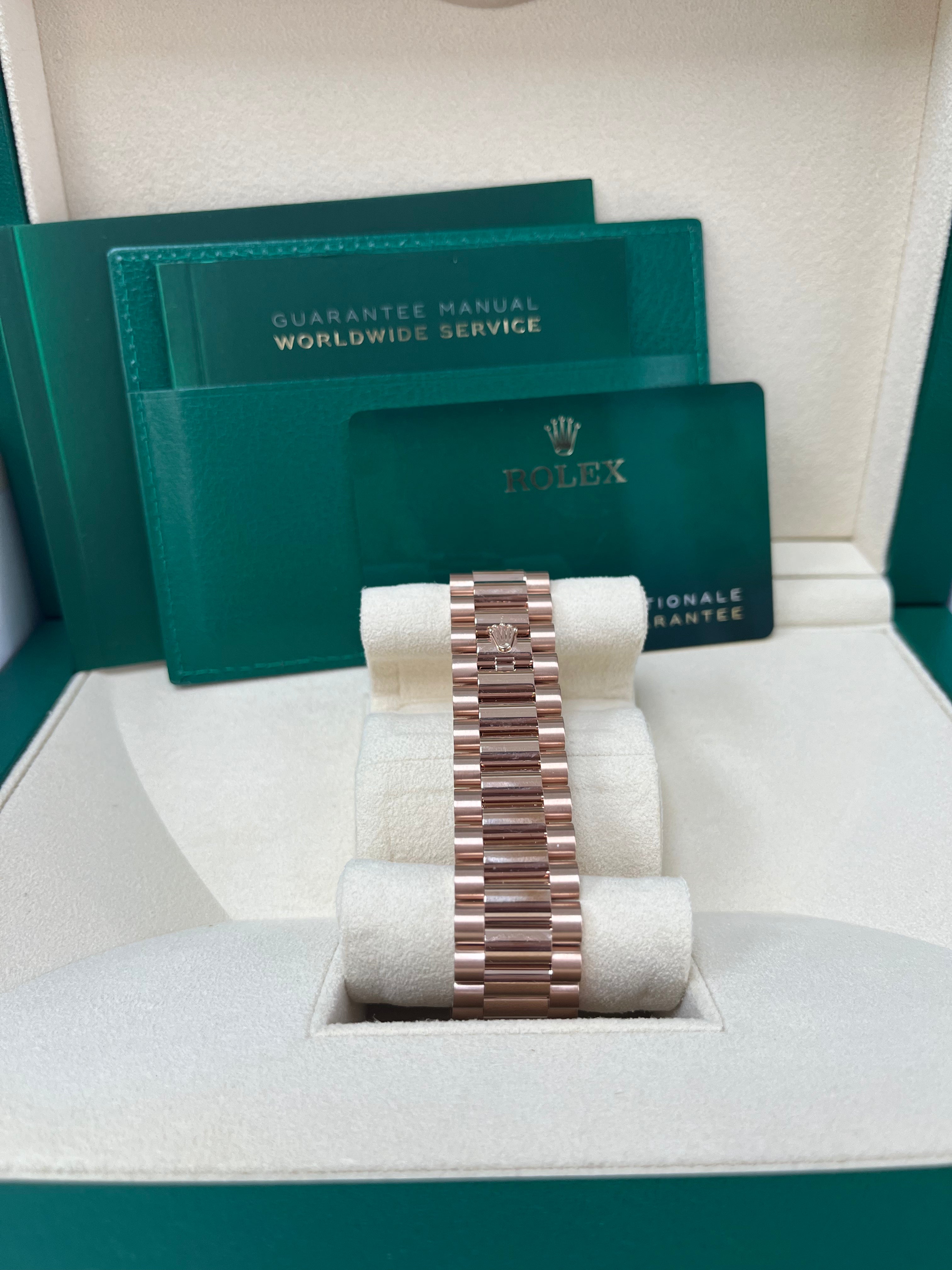 Rolex Day Date 40 Rose Gold Watch with Green Roman Dial & Fluted Bezel (Ref#228235) - Luxury Dress Watch for Business & Formal Occasions