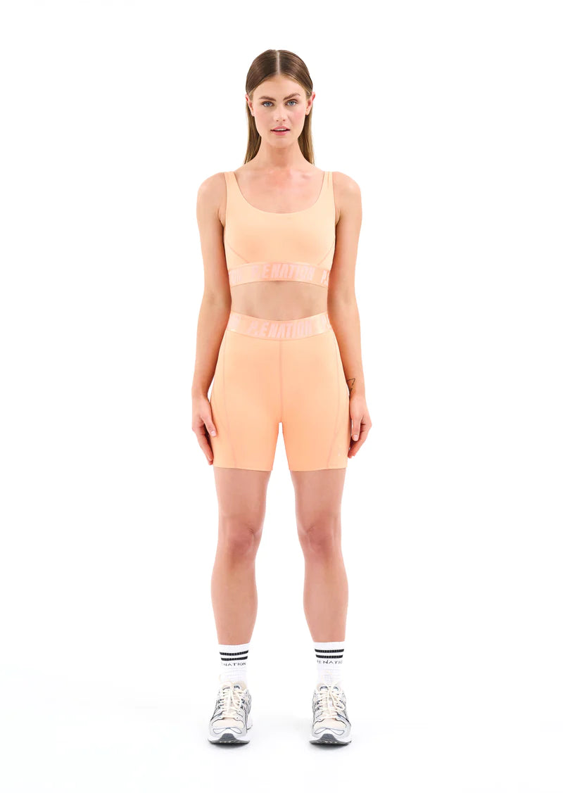 BACKCHECK BIKE SHORTS in Cantaloupe Color - Comfortable Cycling Shorts for Women & Men - Perfect for Road Biking, Mountain Biking & Indoor Cycling Workouts
