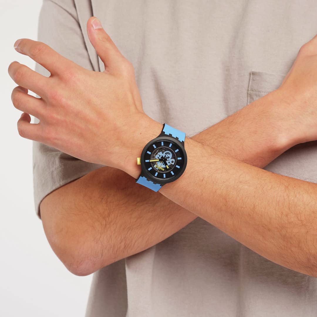 Swatch TRAVEL BY DAY Unisex Watch (Model: SB03B108) - Stylish Analog Wristwatch for Men & Women - Perfect for Travel, Business & Everyday Wear
