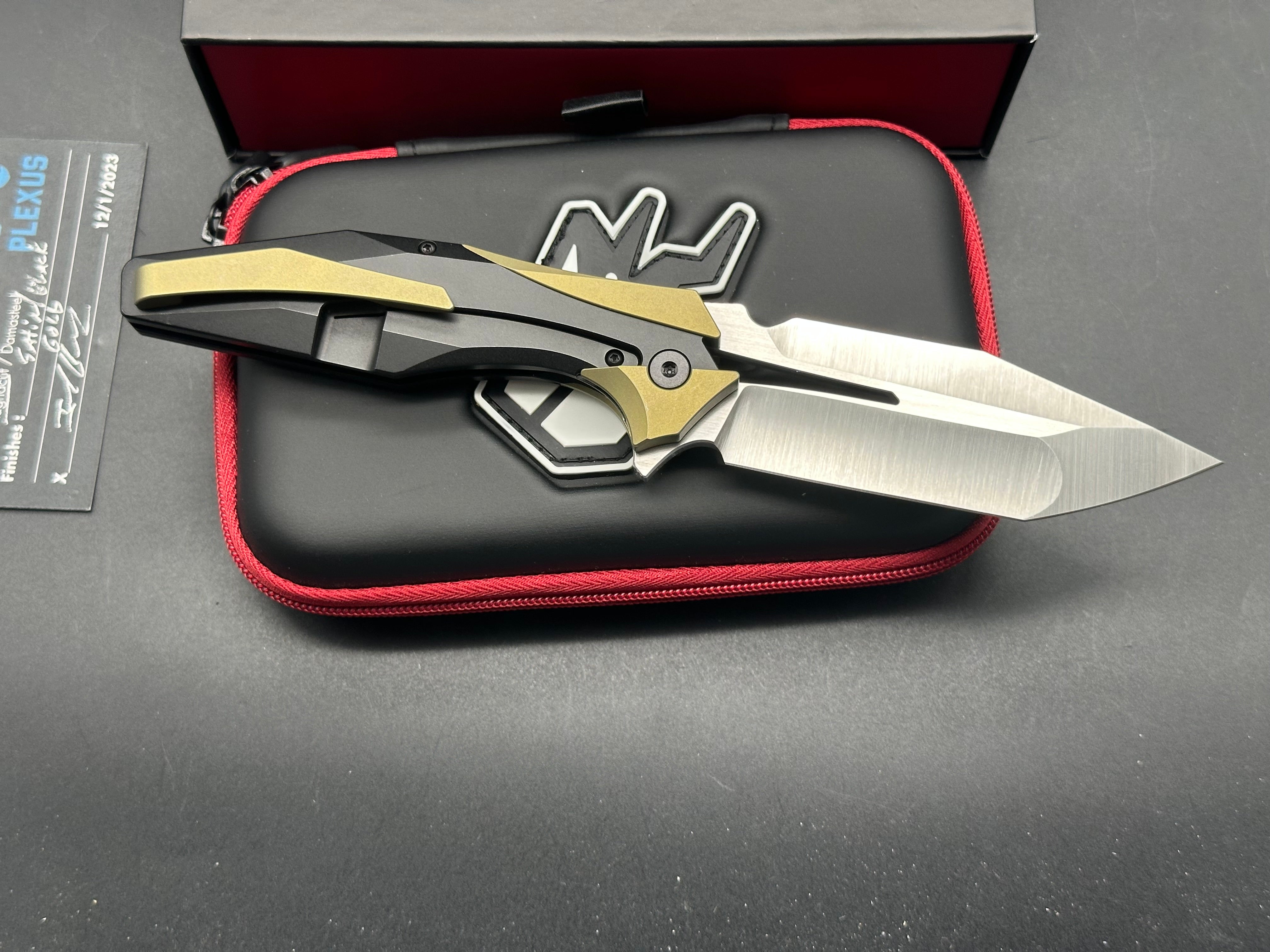 Arcane Design Plexus Black DLC Titanium Frame Knife with Gold Titanium Bolster Inlays - Modified Tanto Blade in M390 Steel - EDC, Outdoor, Tactical, and Collection Use