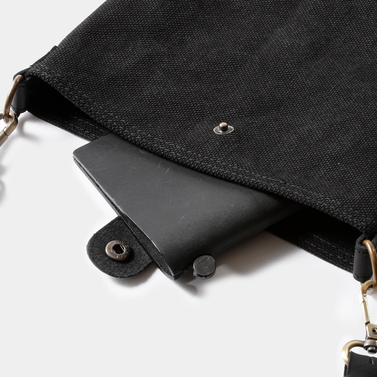 TRAVELER'S COMPANY Canvas Shoulder Bag - Compact S Size in Black | Durable & Stylish Travel Bag for Commuting, Work & Everyday Use