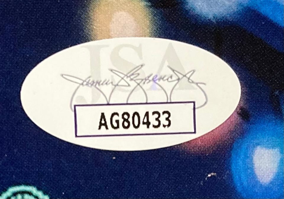 Chevy Chase & Beverly D'Angelo Autographed 11x17 Christmas Vacation Movie Photo with JSA Certificate - Perfect for Holiday Decor, Movie Memorabilia Collectors & Christmas Vacation Fans