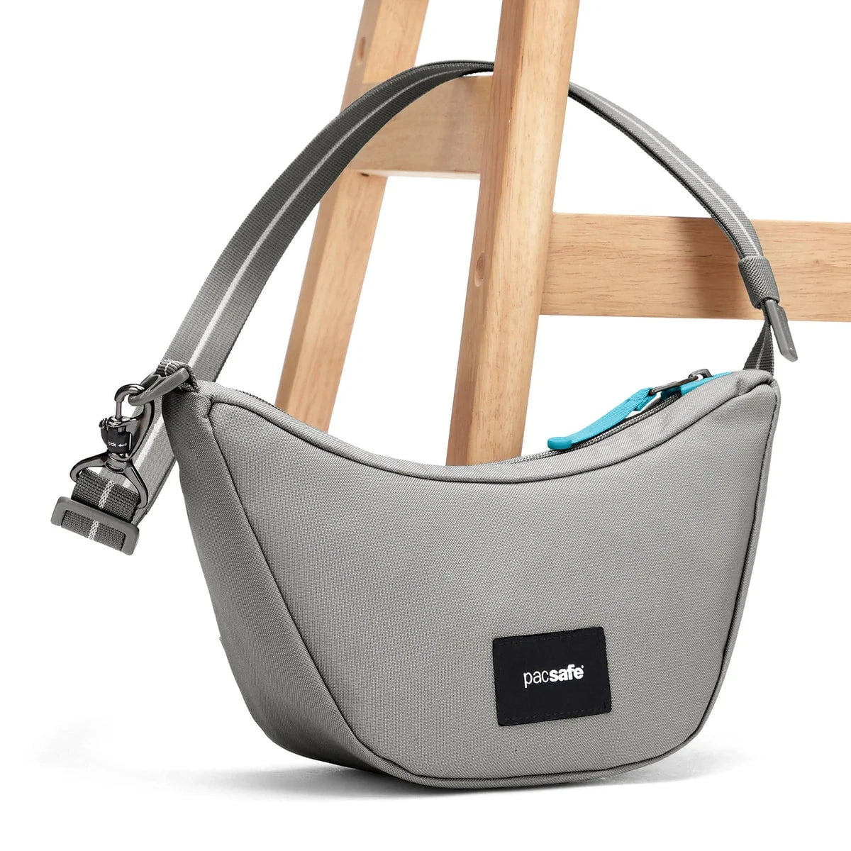 Pacsafe GO Anti-Theft Lunar Crossbody Bag - Secure & Stylish Travel Purse for Women - Perfect for Commuting, Shopping & Sightseeing