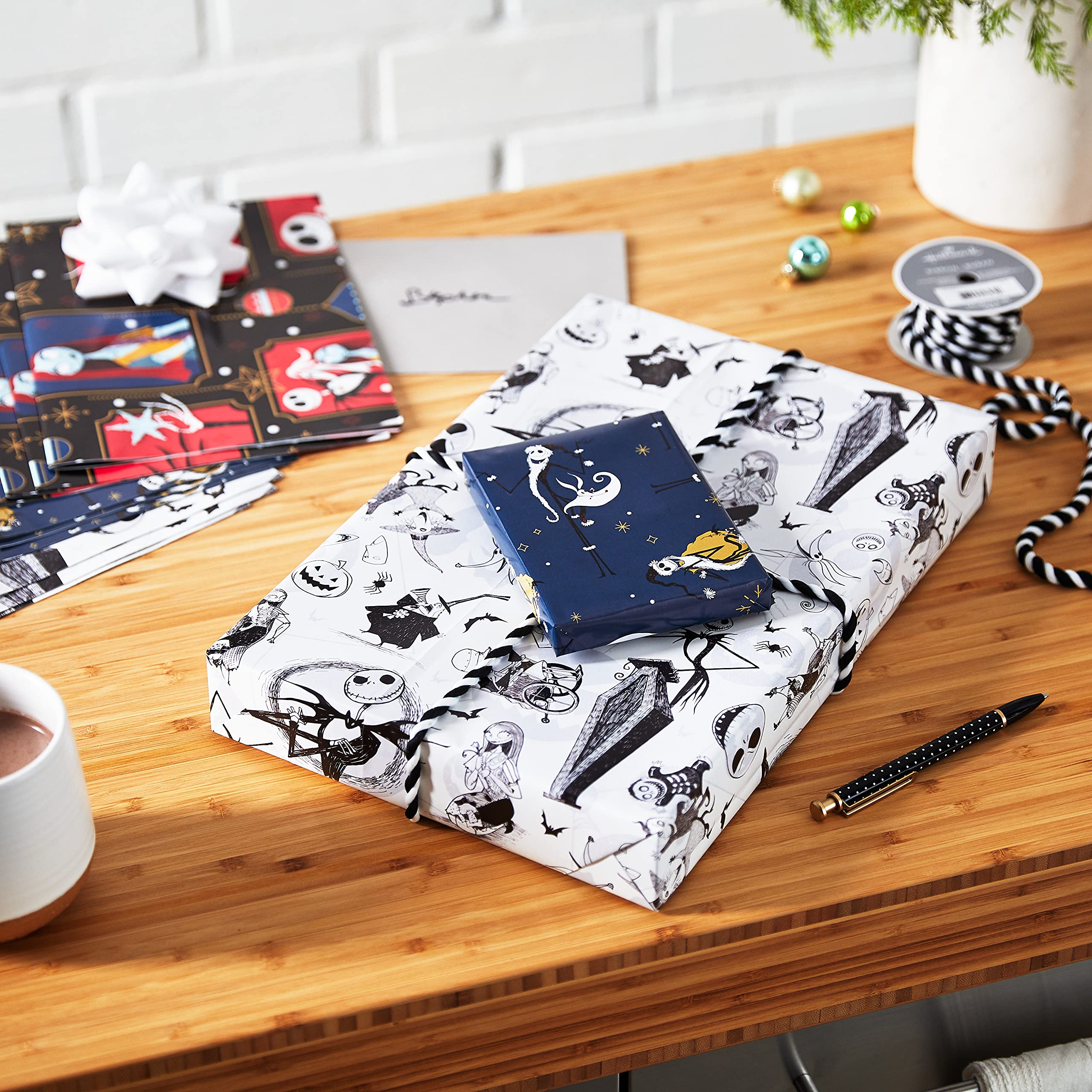 Hallmark Nightmare Before Christmas Wrapping Paper & Gift Bags Set - 12 Sheets & 3 Bags for Halloween, Christmas, Birthday Gifts - Perfect for Holiday Parties, Gift Exchanges & Themed Celebrations