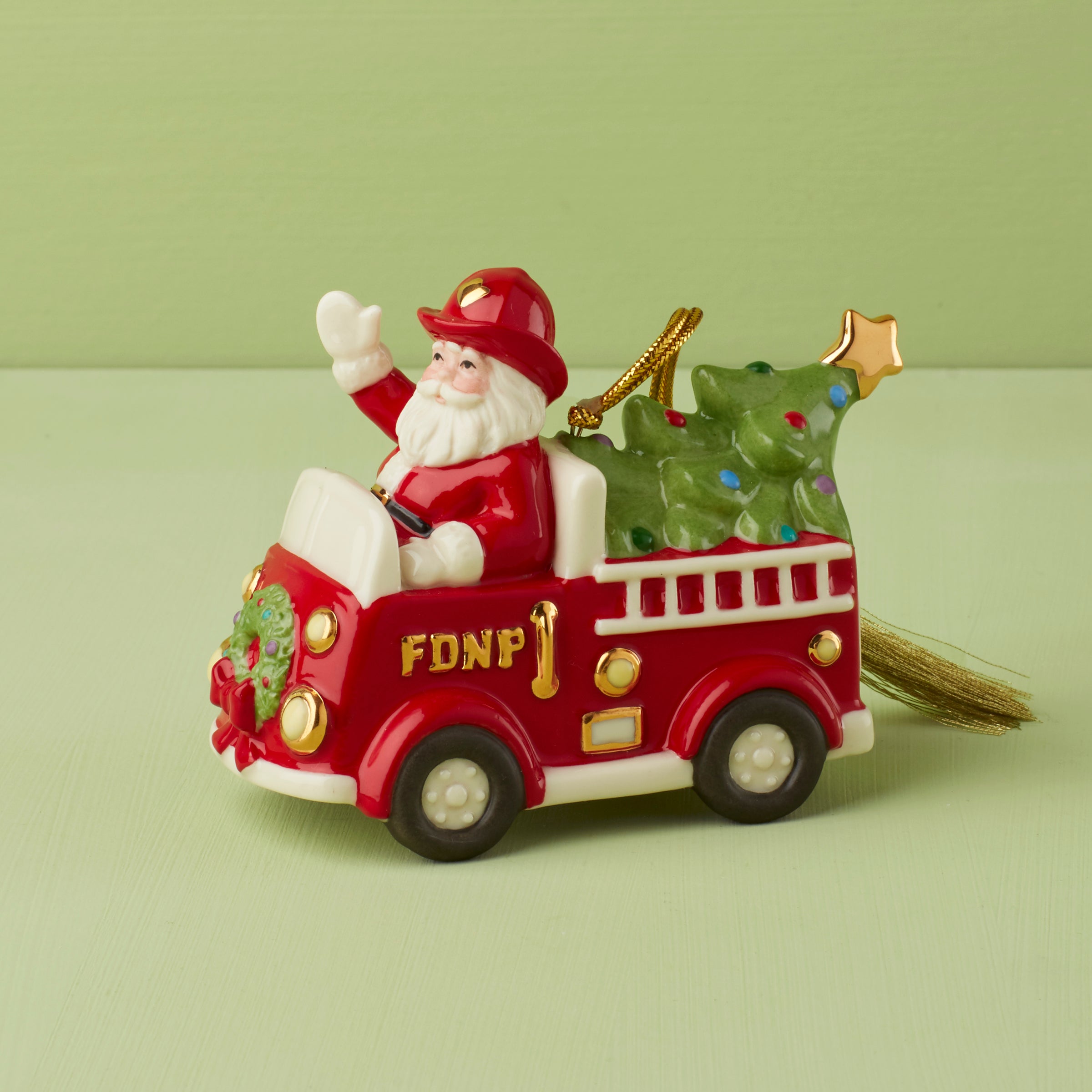 Santa in Fire Truck Christmas Ornament - Festive Holiday Decor for Tree, Gift, and Home Decoration