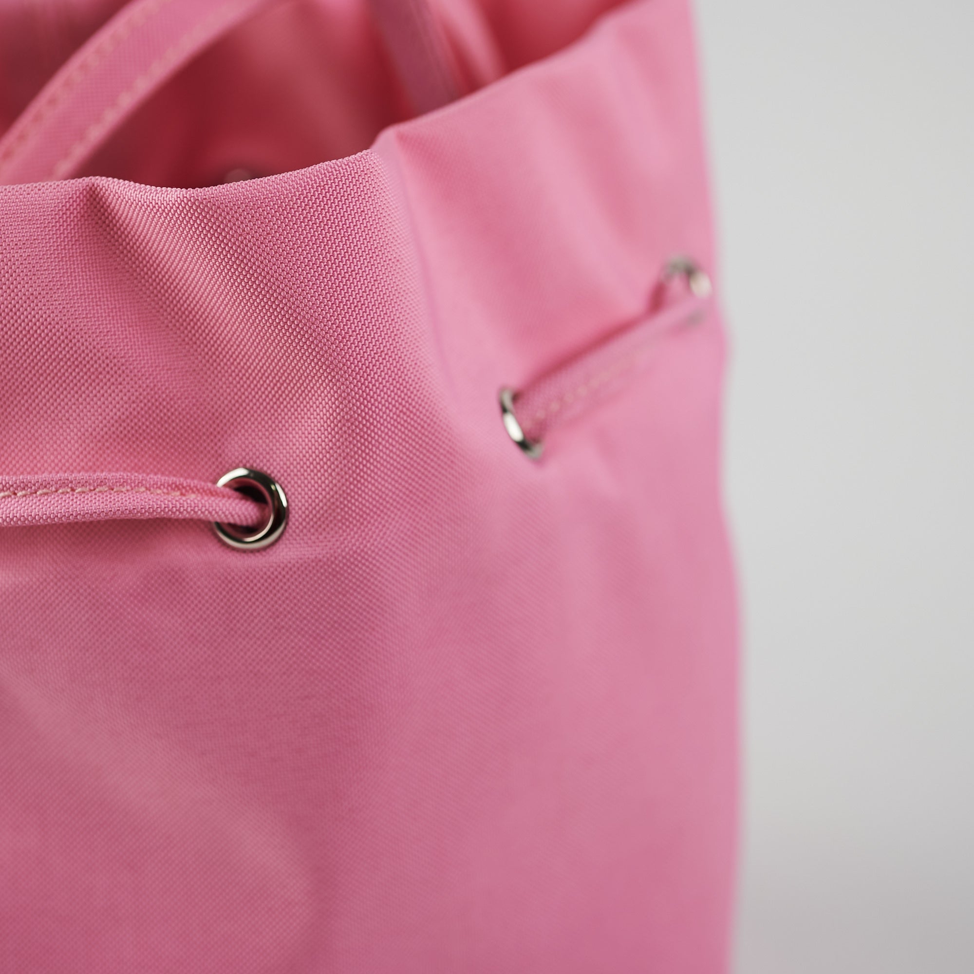 Balenciaga Nylon Wheel XS Bucket Bag in Pink | Luxury Designer Handbag for Women | Perfect for Everyday Use, Travel & Fashion Outings
