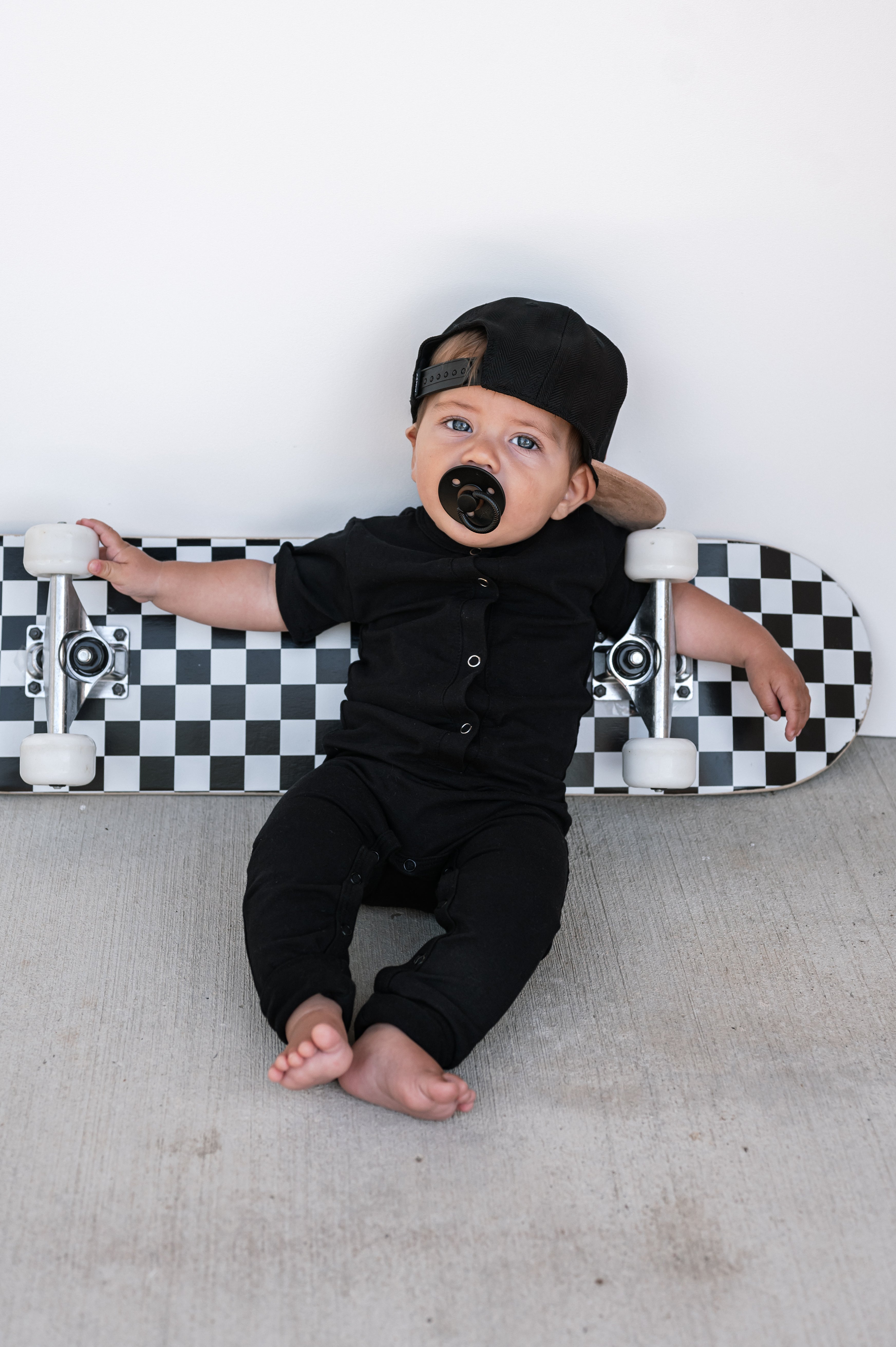Classic Black Snap Romper for Babies - Comfortable & Stylish Outfit for Newborns, Infants, and Toddlers | Perfect for Playdates, Family Photos, and Everyday Wear