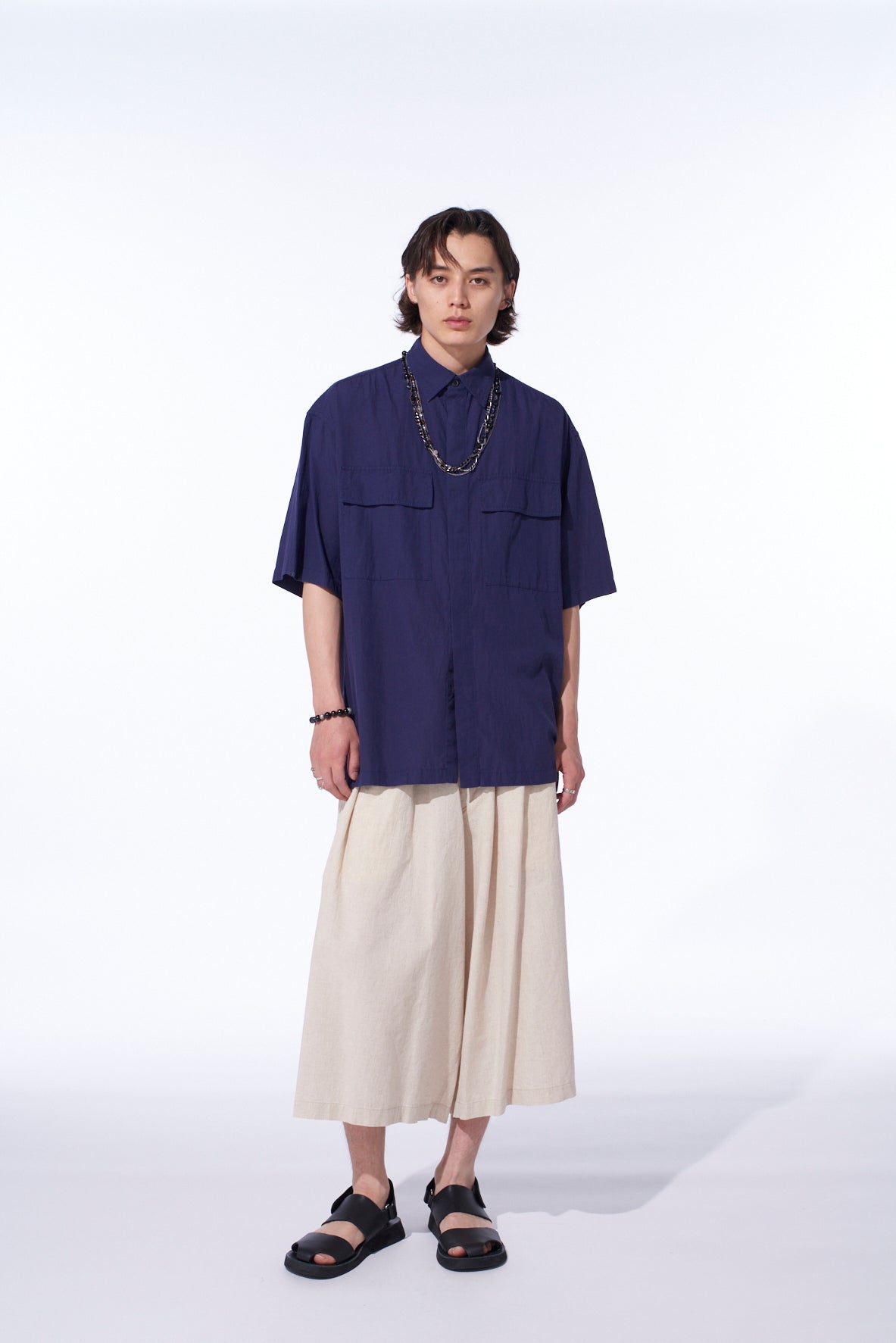Stylish Oversized Short Sleeve Chambray Shirt with Flap Pockets - Casual Summer Wear for Women & Men | Perfect for Beach Outings, Picnics, and Weekend Getaways