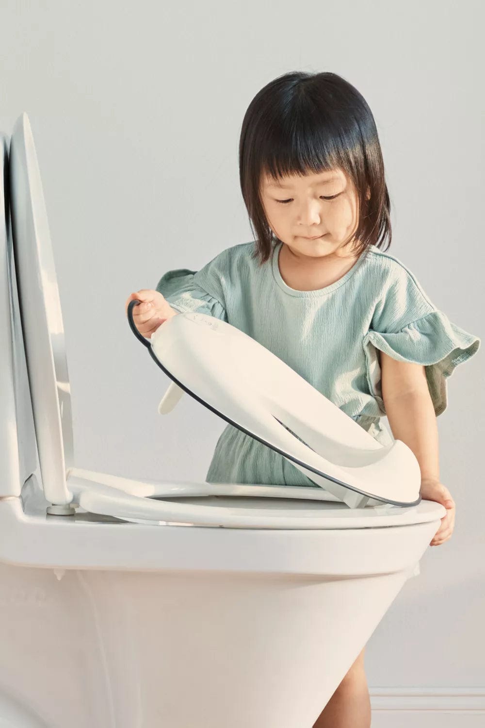BabyBjorn Potty Chair for Toddlers - Soft & Comfortable Toilet Training Seat with Non-Slip Base - Perfect for Boys & Girls Learning Independence (Home & Daycare Use)