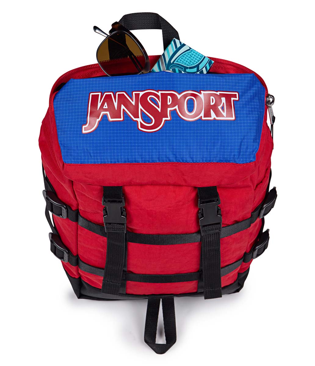 JanSport Mini Skip Backpack - Lightweight & Durable School Bag for Students & Travel, Red Tape Design - Perfect for College, Hiking & Everyday Use