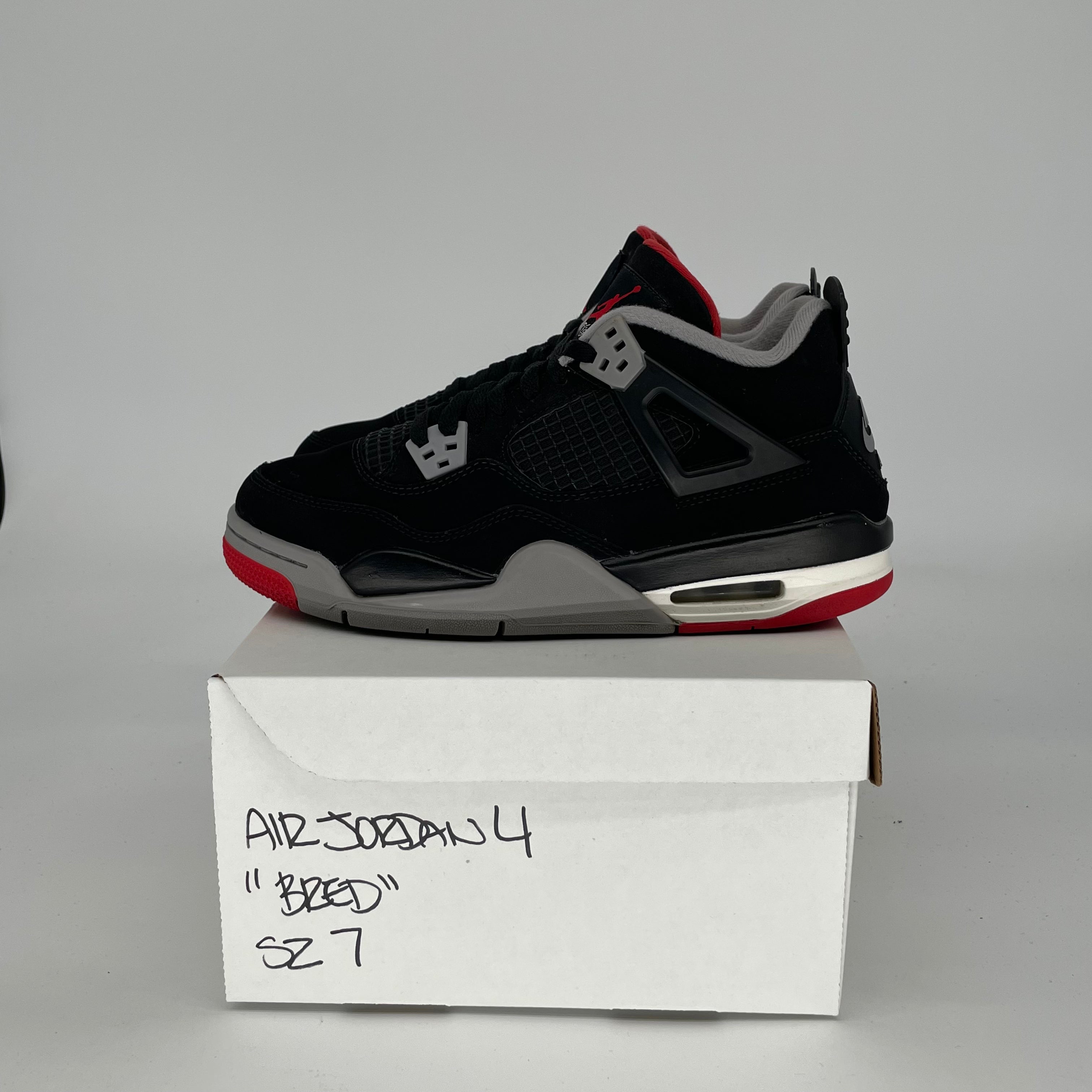 Original Title: AIR JORDAN 4 BRED SIZE 7/8.5W 408452 060   Optimized Title: **Air Jordan 4 Retro 'Bred' Black/Red Men's & Women's Basketball Shoes Size 7 & 8.5W (Style: 408452-060) – Perfect for Streetwear & Sneaker Collectors**