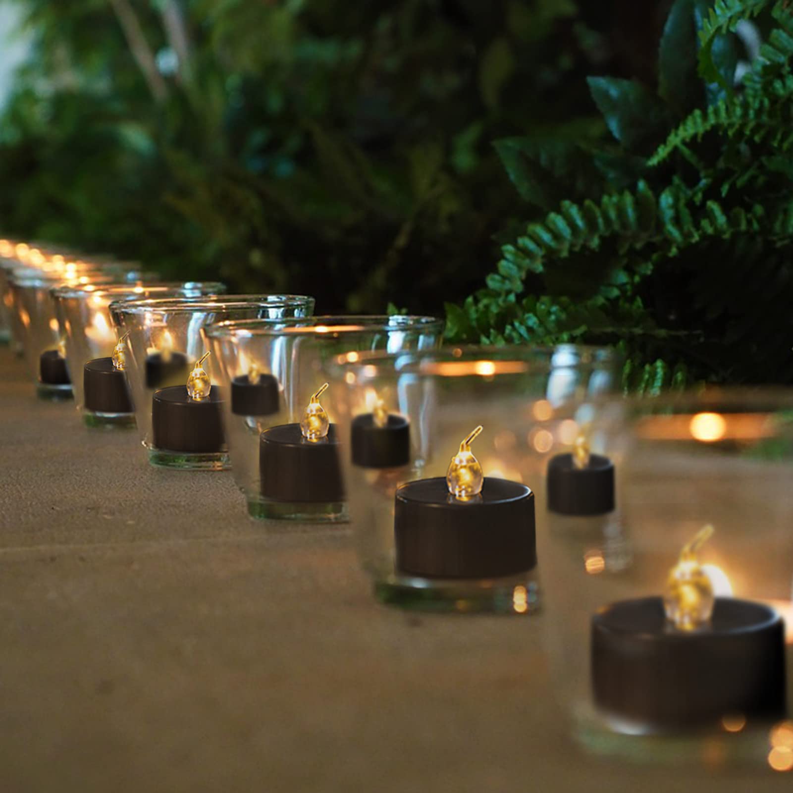 LANKER 24 Pack Black Tea Light Candles - Flameless LED Candles with Flickering Warm Yellow Flame, Battery Operated Fake Candles for Wedding, Halloween & Christmas Decor - Perfect for Centerpieces, Table Settings & Holiday Displays