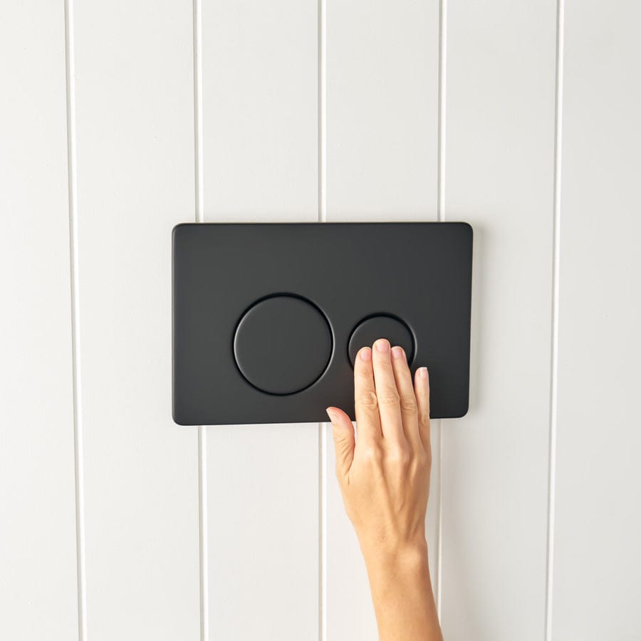 Modern Curved In-Wall Toilet with Round Matte Black Buttons - Space-Saving Wall-Mounted Design for Contemporary Bathrooms