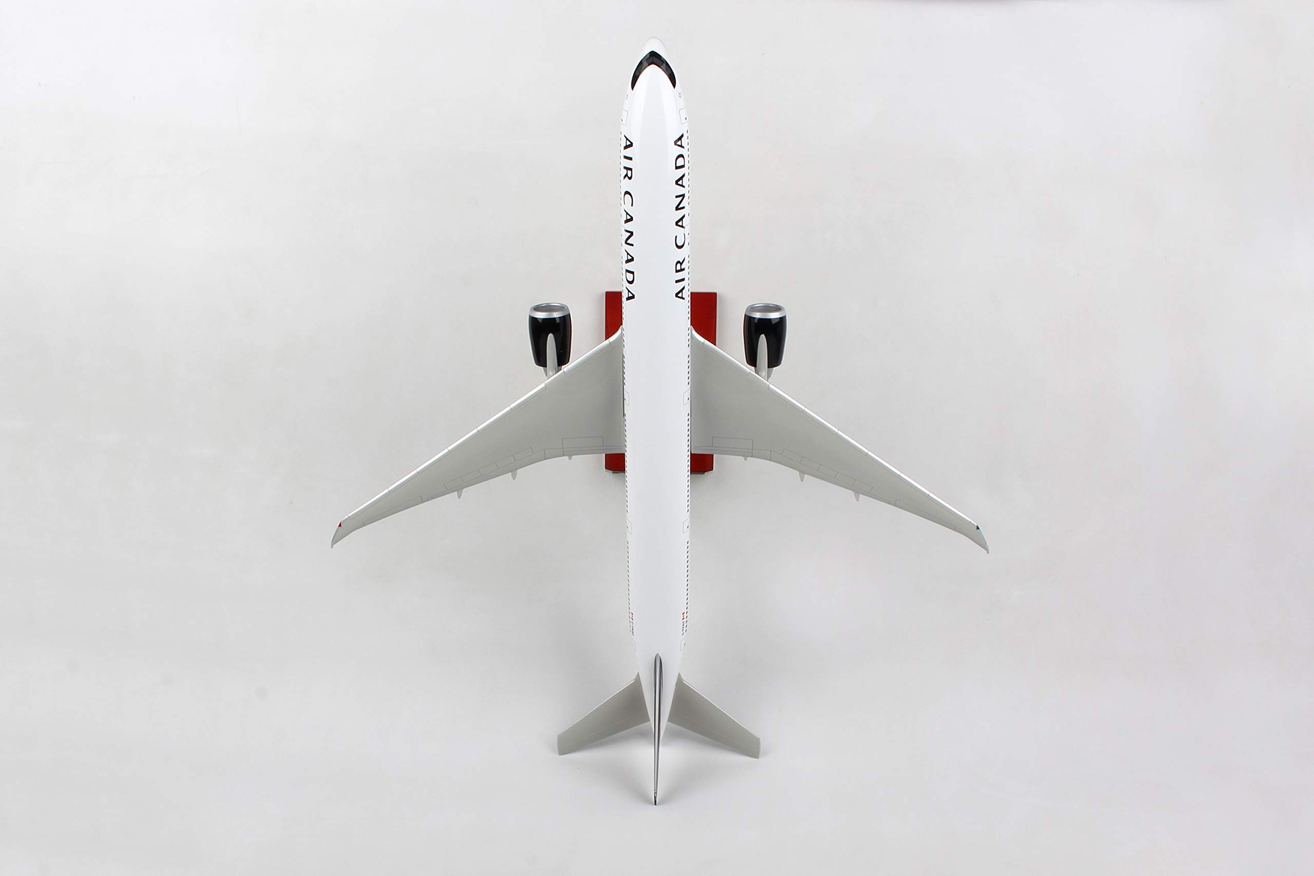 Daron 1/100 Scale Air Canada Boeing 777-300ER Diecast Model Airplane with Wood Display Stand & Landing Gear - Collectible Aircraft for Aviation Enthusiasts, Home Office Decor & Gift for Plane Lovers