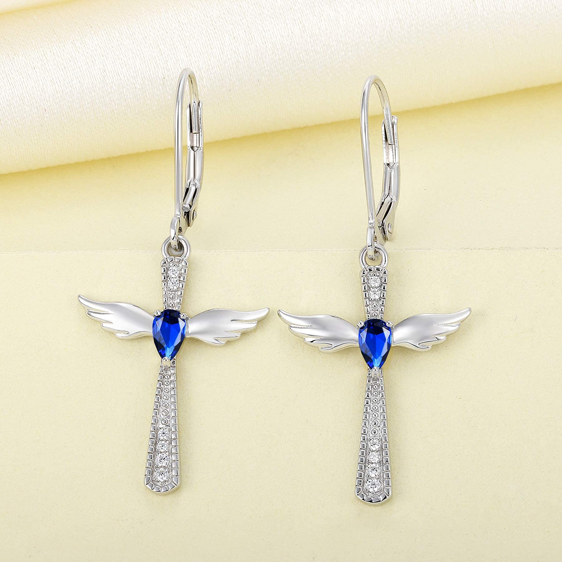 YL 925 Sterling Silver Cross Pendant Necklace with Cubic Zirconia & Angel Wing Dangle Earrings Set - Elegant Teardrop Created Sapphire Jewelry for Women, Perfect for Church, Weddings, Date Nights and Gift Giving