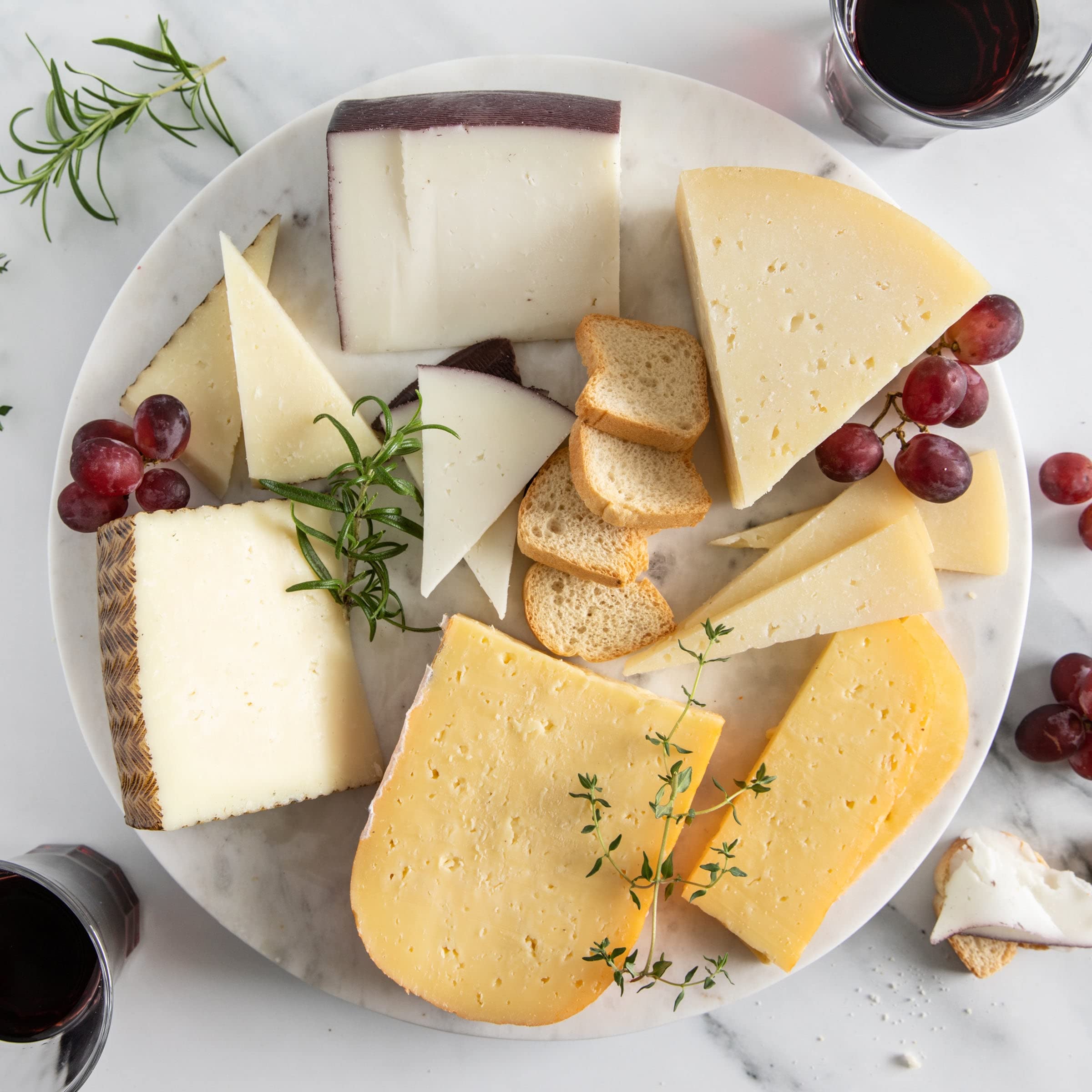 Premium Spanish Cheese Tasting Gift Box - Authentic Manchego, Mahon Reserva, Idiazabal & Murcia al Vino Cheeses from Spain - Includes Mini Toast Crackers & Cheese Knife - Perfect for Wine Pairing, Charcuterie Boards & Gourmet Gifts