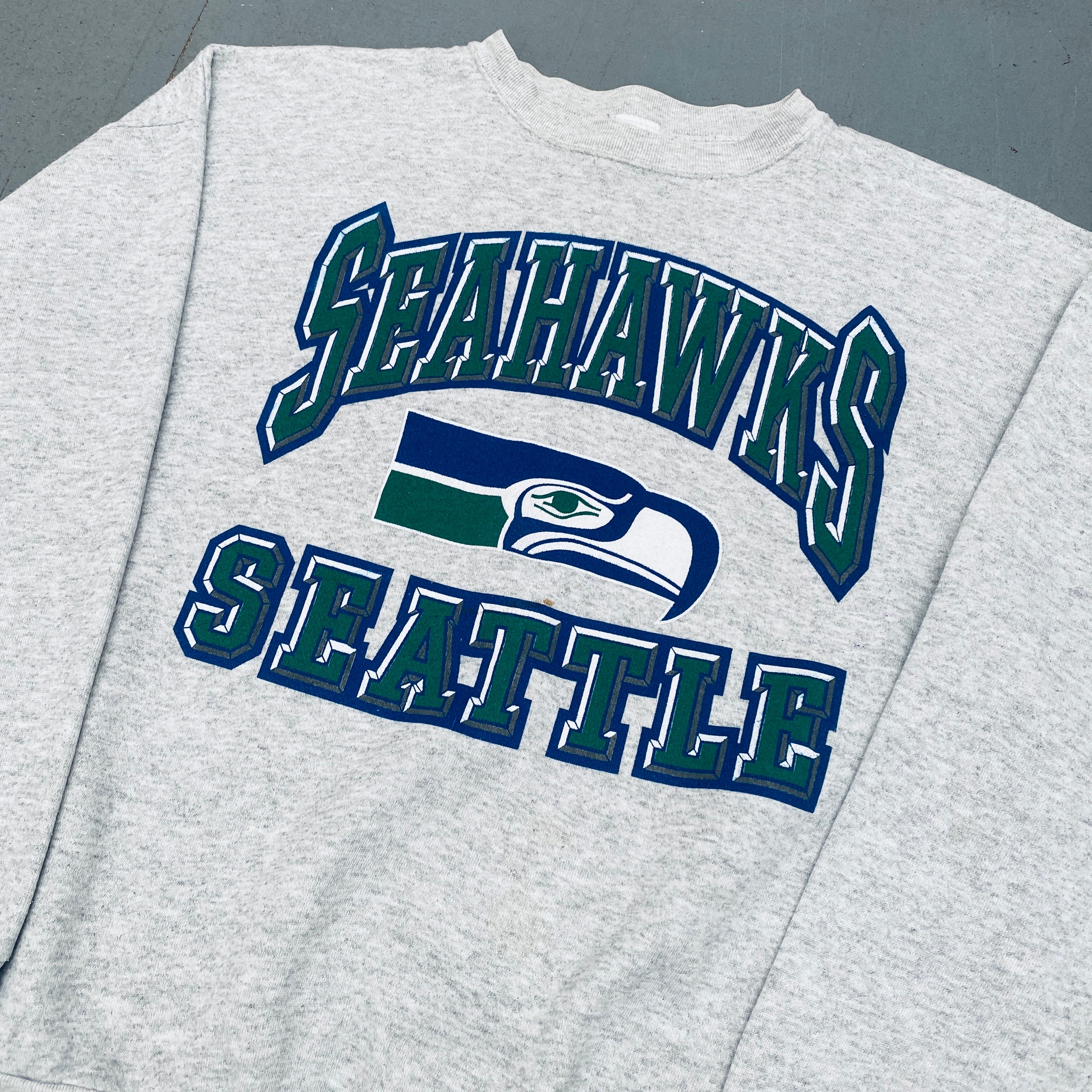 Seattle Seahawks 1990s Logo Graphic Spellout Sweatshirt (Large) - Vintage NFL Fan Apparel for Game Day & Casual Wear