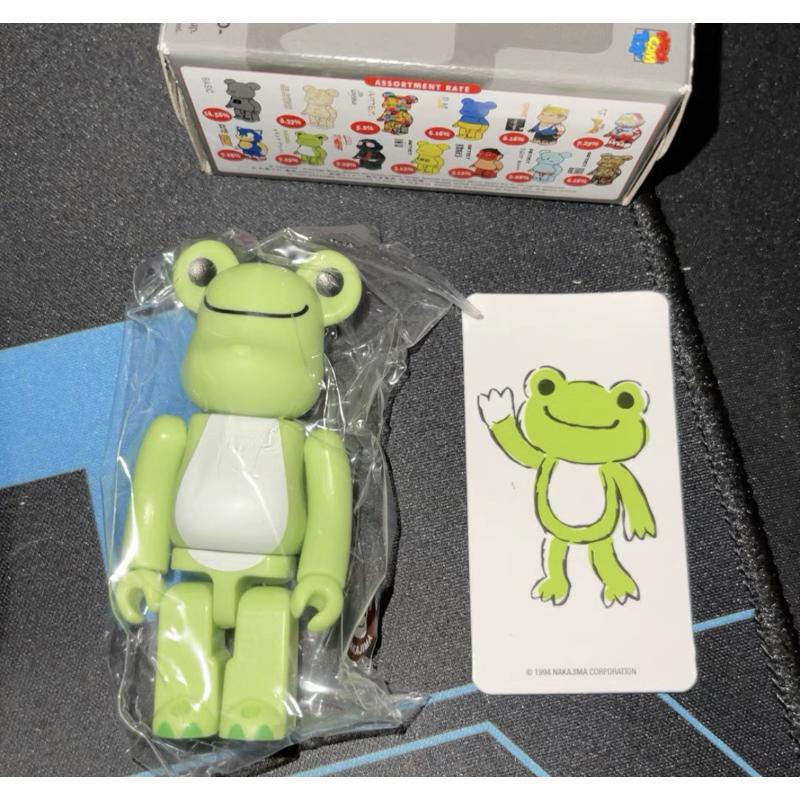 Bearbrick Series 46 Pickles The Frog 100% Collectible Vinyl Art Toy - Limited Edition Designer Figure for Display & Gift Giving - Perfect for Anime Fans, Kawaii Decor, and Pop Culture Collectors