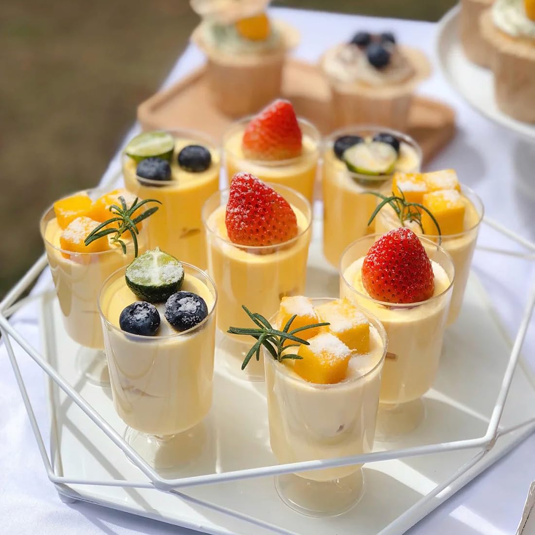 Zezzxu 40-Pack 3.4 oz Mini Dessert Cups with Spoons - Small Plastic Footed Goblet Glasses for Mousse, Appetizers, Puddings, Parfait - Perfect for Parties, Catering & Home Entertaining