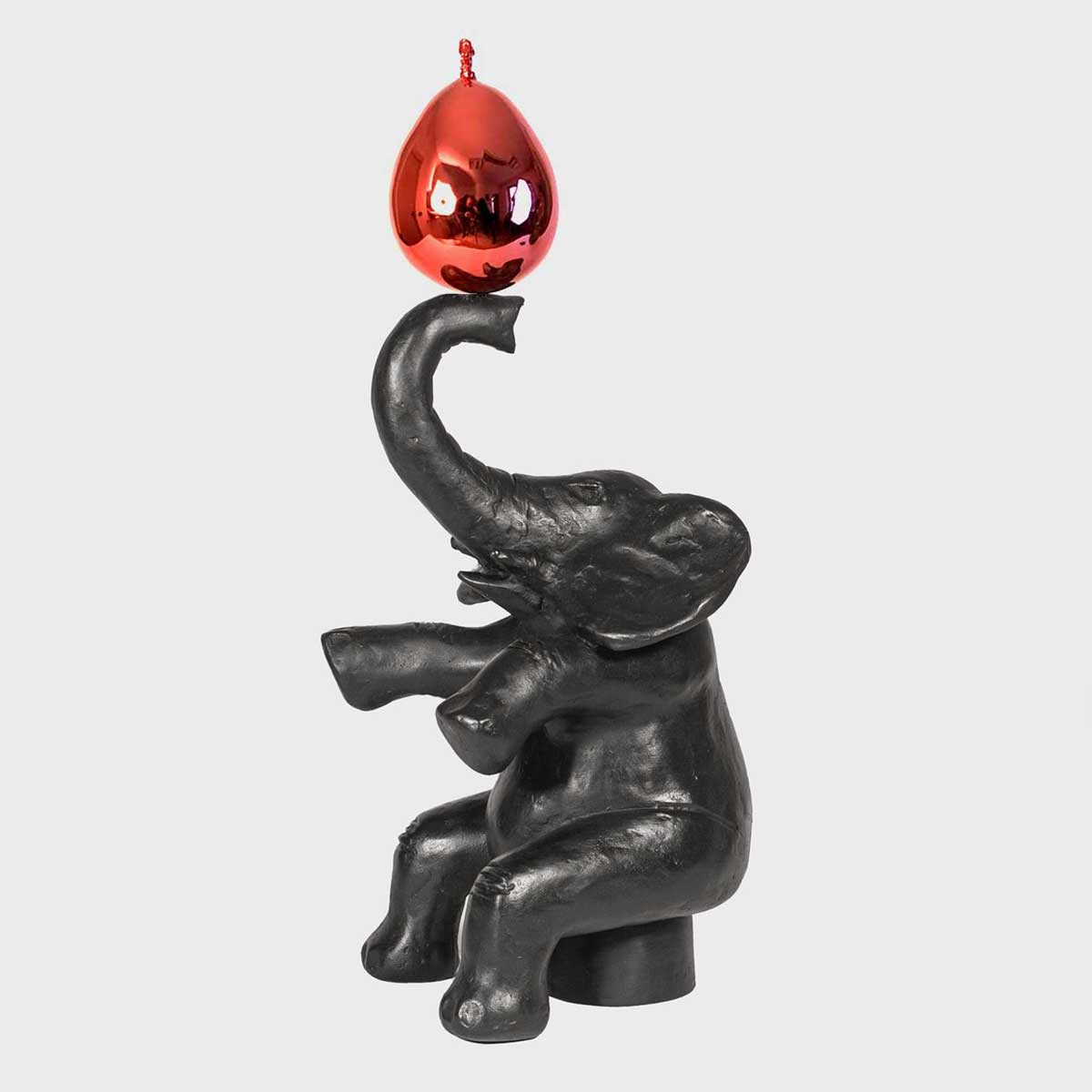 Red balloon with black elephant