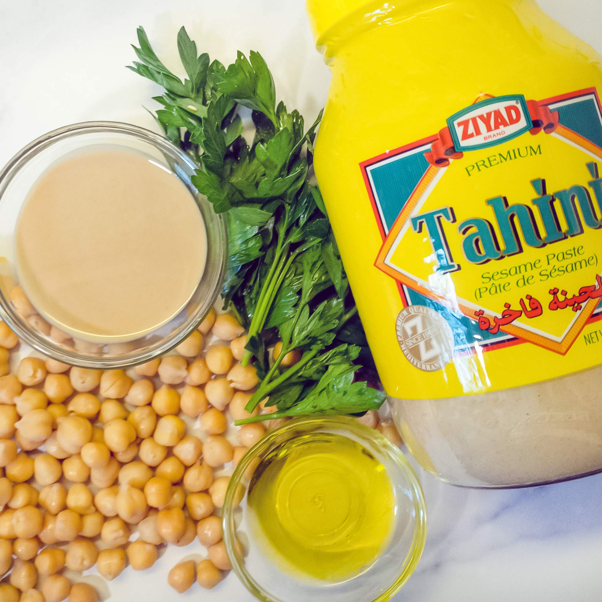 Ziyad Premium Tahini Sesame Paste - 100% Natural, No Additives or Preservatives - Perfect for Hummus, Pita Bread, Salads & Cooking - 32oz (Pack of 4) - Ideal for Middle Eastern Cuisine & Healthy Recipes