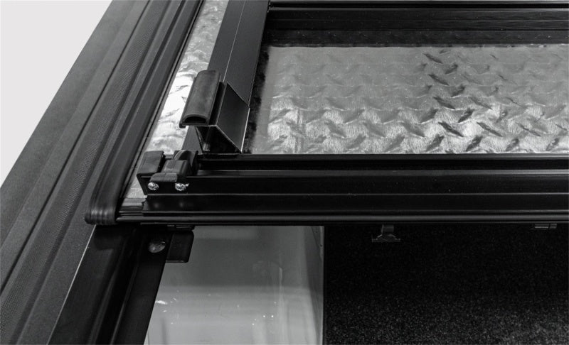 LOMAX Tri-Fold Truck Bed Cover | Black Urethane Finish | Fits 2019 Dodge Ram 5'7