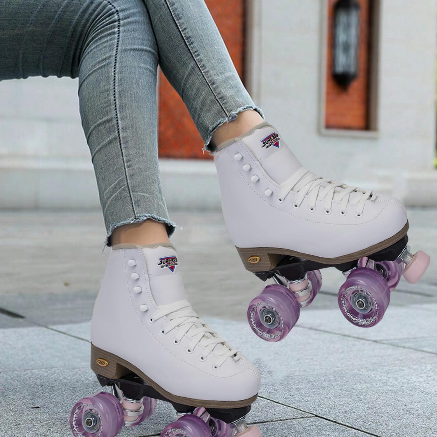 Sure-Grip Fame White Vegan Outdoor Roller Skates with Pink Motion Wheels - Microfiber Lined Boot, Rock Nylon Plates & Aluminum Trucks - Pink Cushions & Toe Stop - Perfect for Park, Trail & Urban Skating