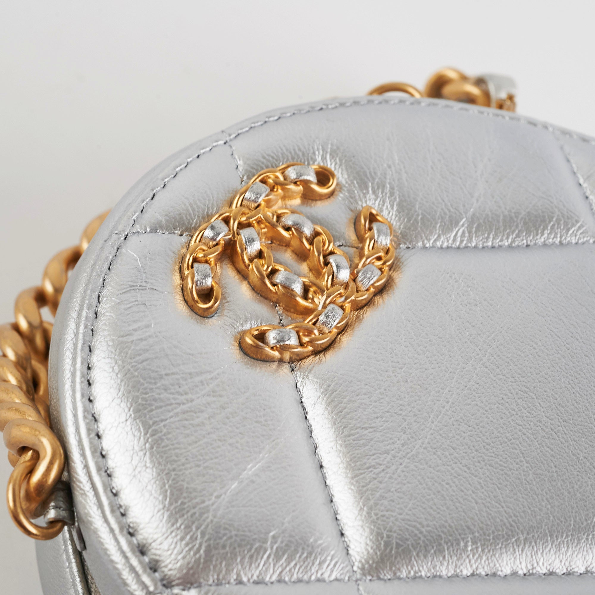 Chanel 19 Round Clutch Bag in Metallic Silver - Luxury Designer Handbag for Women | Perfect for Evening Parties, Weddings & Special Occasions