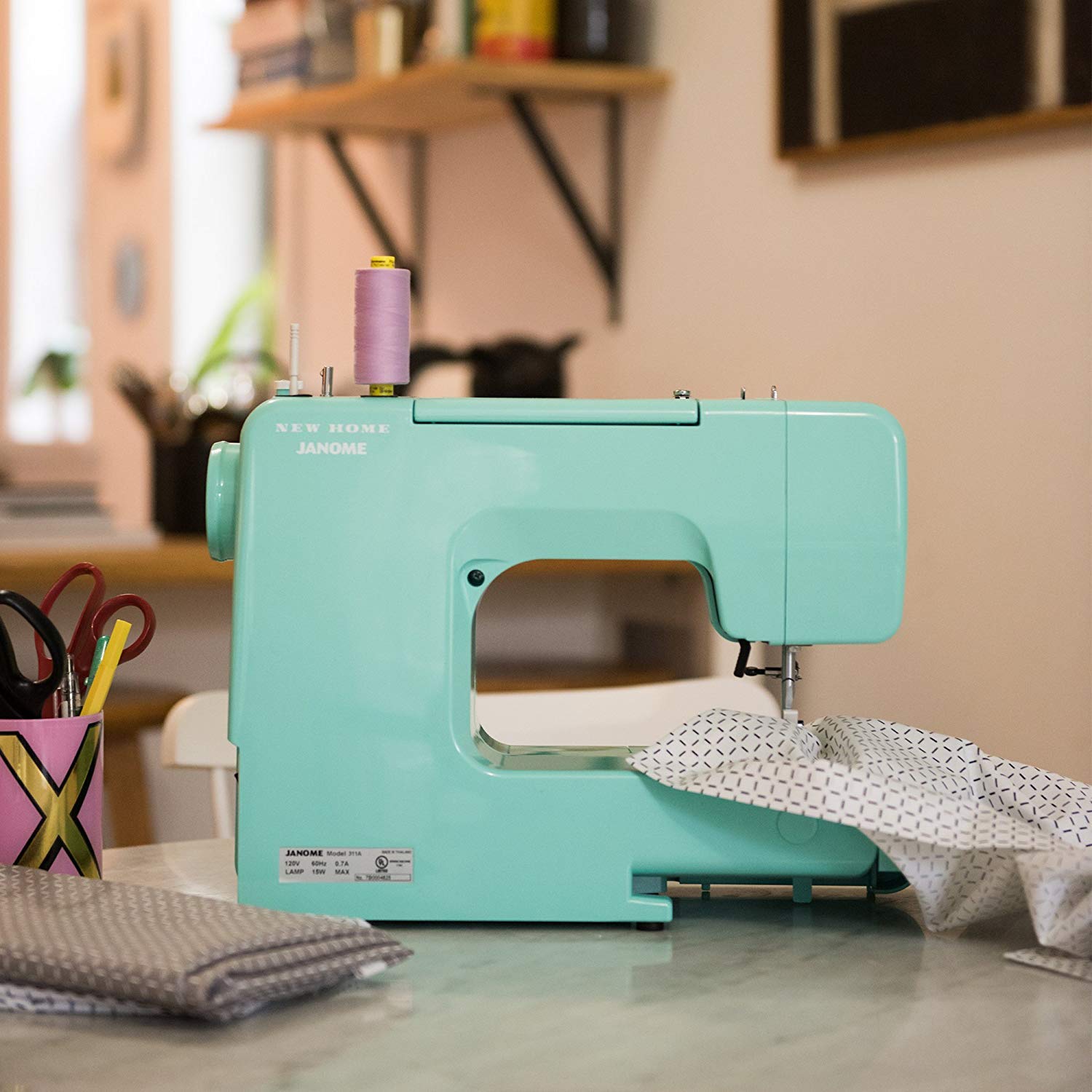 Janome Arctic Crystal Easy-to-Use Sewing Machine for Beginners - Built-in Metal Frame, Bobbin Diagram & Tutorial Videos - Perfect for DIY Crafts, Home Decor & Fashion Sewing Projects (Turquoise)
