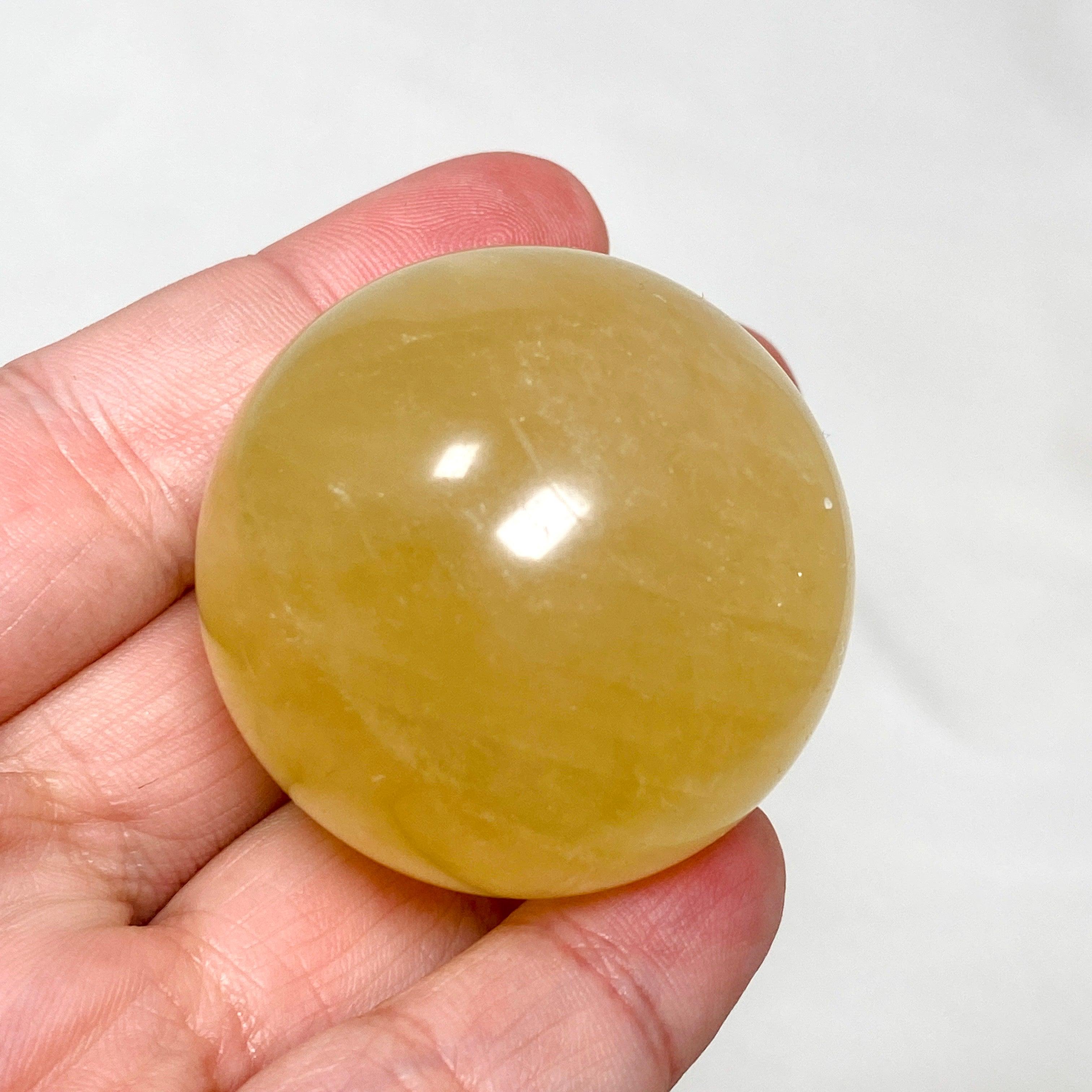 Natural Honey Calcite Sphere - 120-130g - Healing Crystal for Meditation, Reiki, and Home Decor