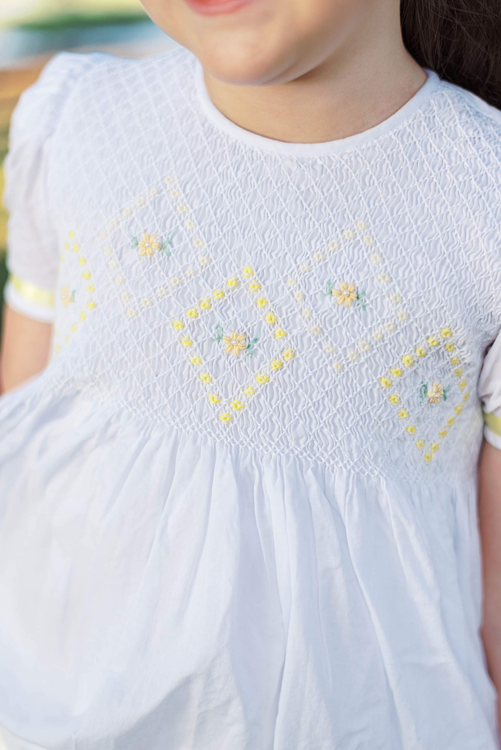 Elegant Hand-Smocked White Easter Dress for Flower Girls with Yellow Ribbon - Perfect for Easter Celebrations, Weddings & Special Occasions