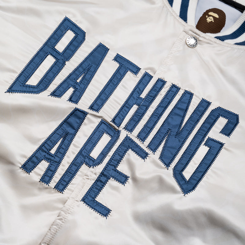 BAPE NYC Logo Camo Varsity Jacket in Ivory - Stylish Streetwear for Urban Fashion & Casual Outfits