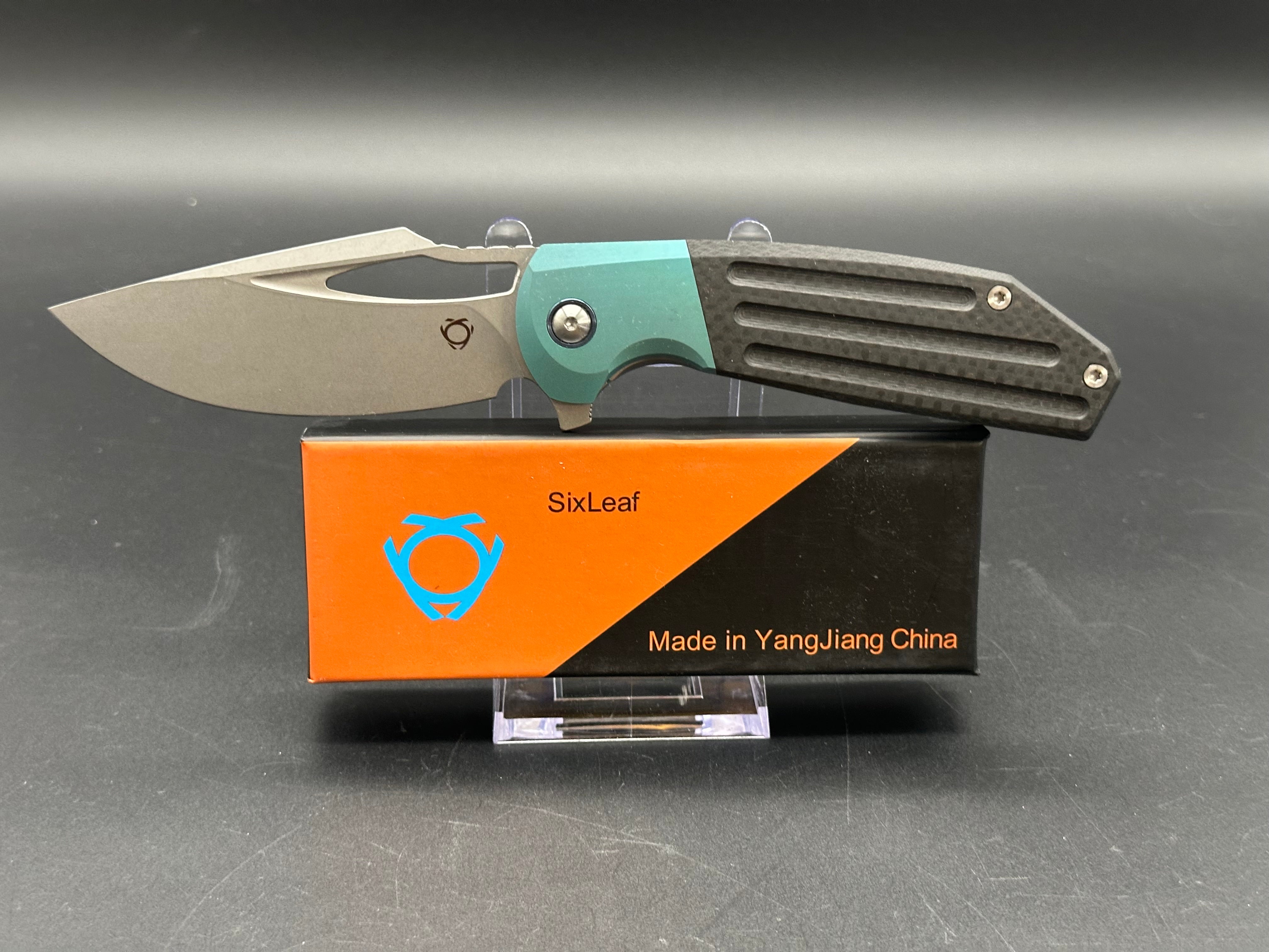 SIXLEAF SL 24 Jerry Jelly Pocket Knife - Plain Edge D2 Blade, Green Titanium Bolster & Carbon Fiber Handle - EDC, Camping, Hiking, Survival Gear