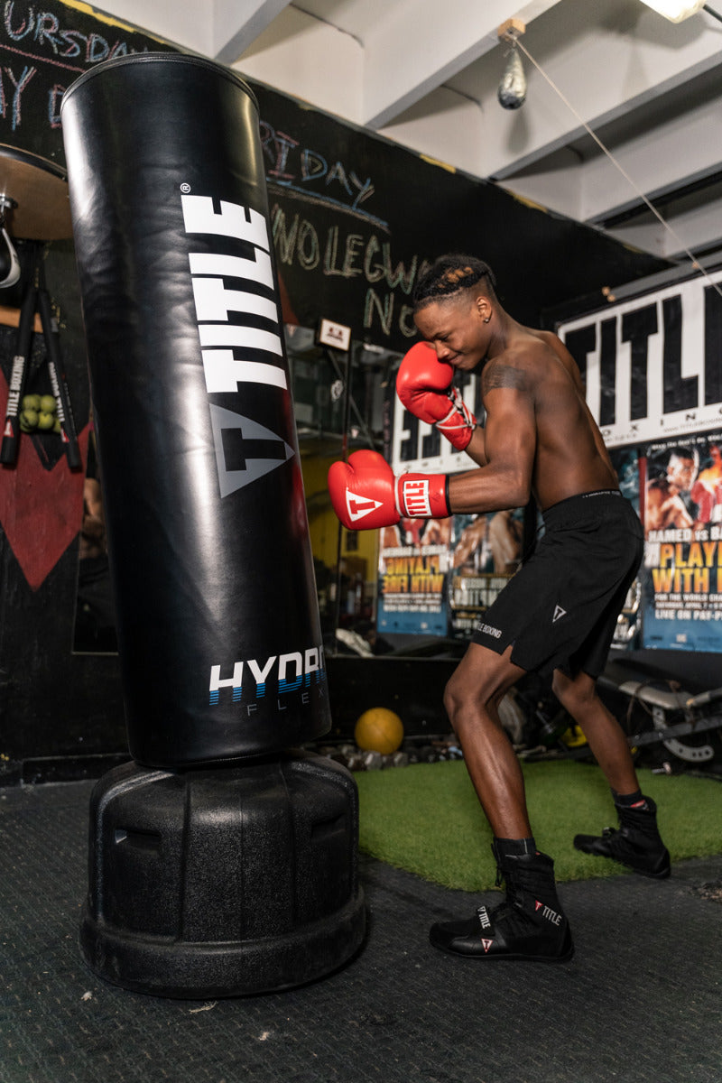 TITLE Boxing Hydro Flex H2O Freestanding Heavy Punching Bag - Professional Training Equipment for Boxing, MMA & Home Gym Workouts - Perfect for Indoor & Outdoor Fitness Training