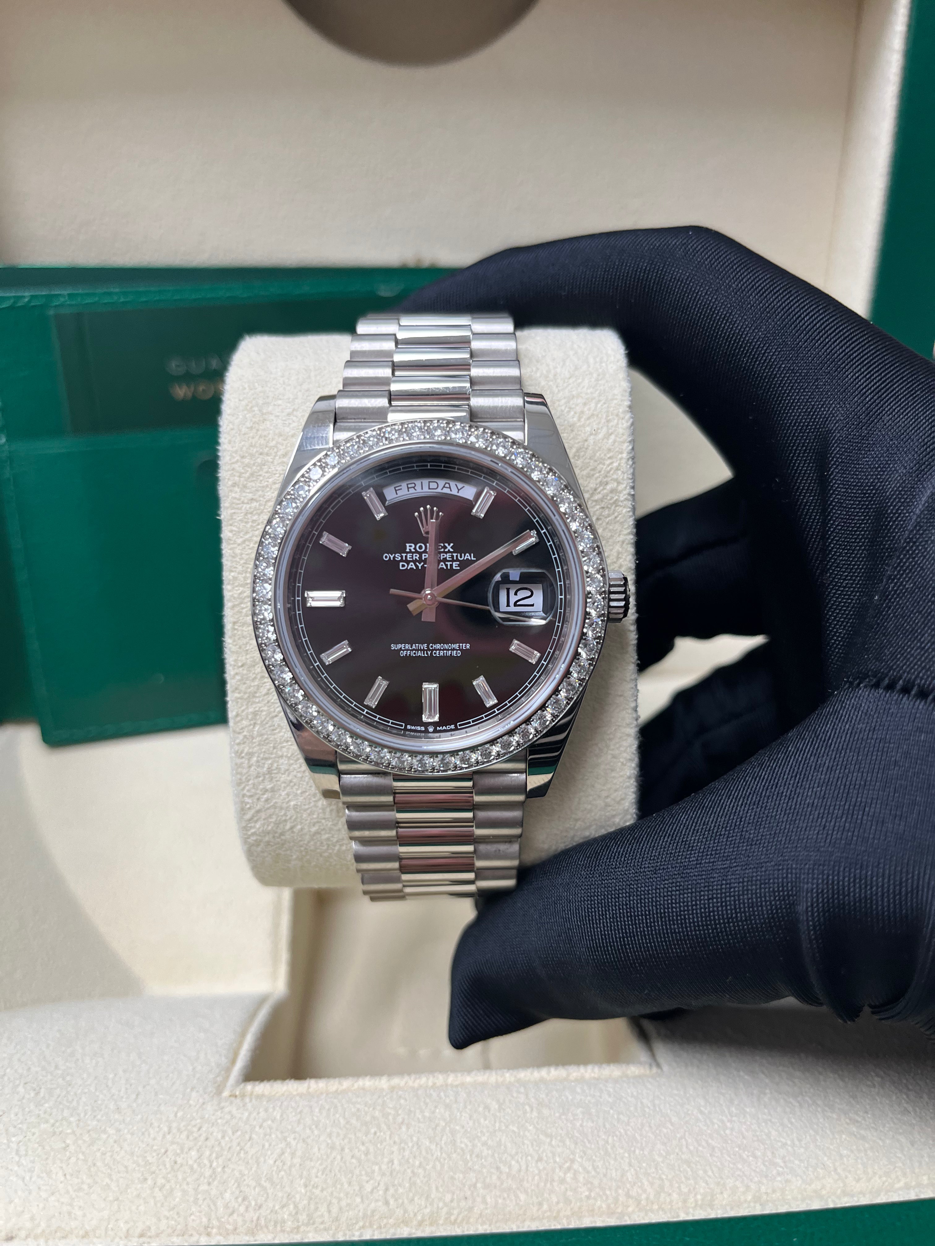 Rolex Day Date 40 White Gold Men's Watch with Black Baguette Diamond Dial & Fluted Bezel - Luxury Dress Watch for Business & Formal Occasions
