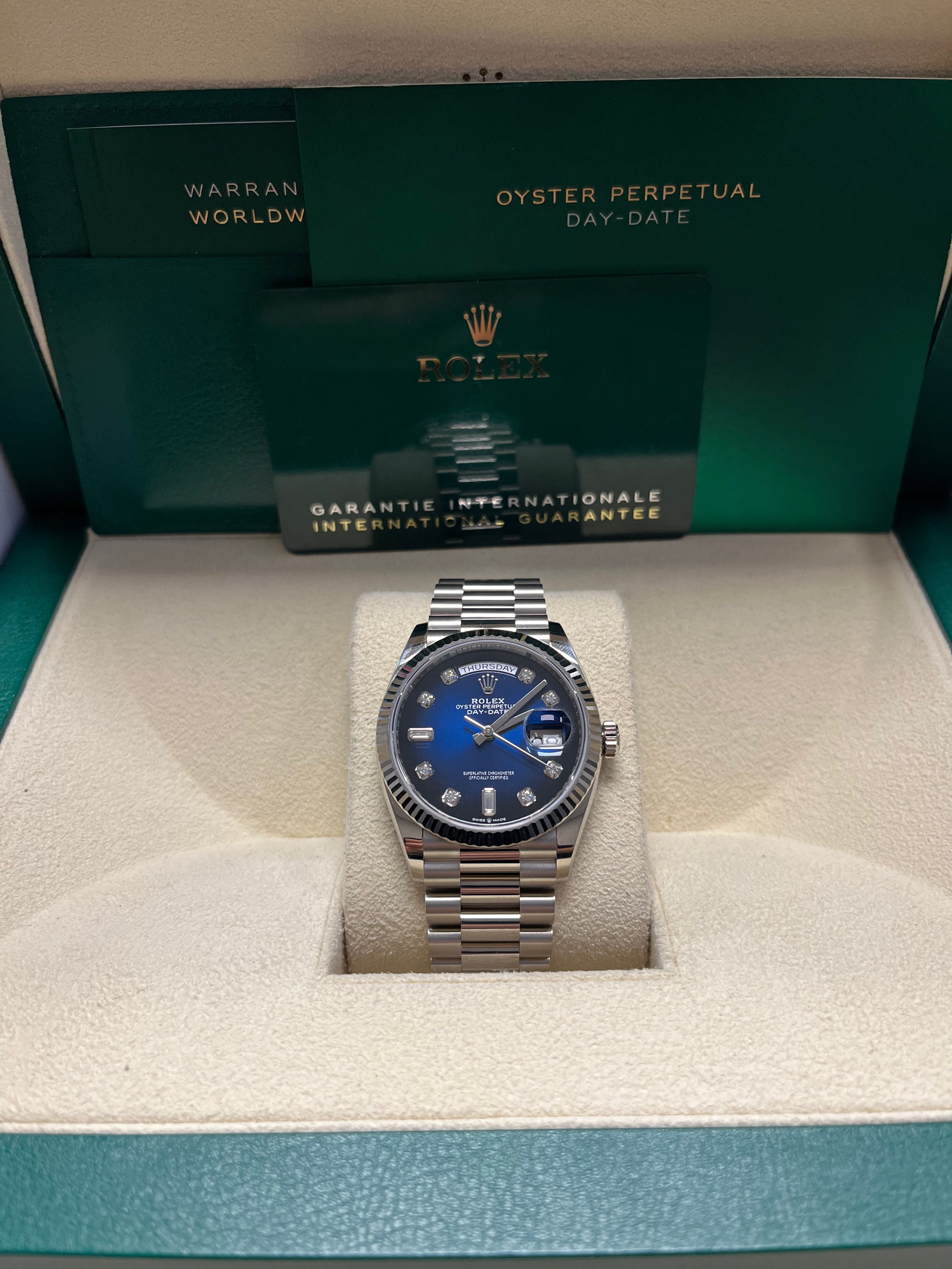 Rolex Day-Date 36 White Gold Watch with Fluted Bezel & Blue Ombre Diamond Dial - President Bracelet (Ref #128239) | Luxury Dress Watch for Business & Formal Occasions