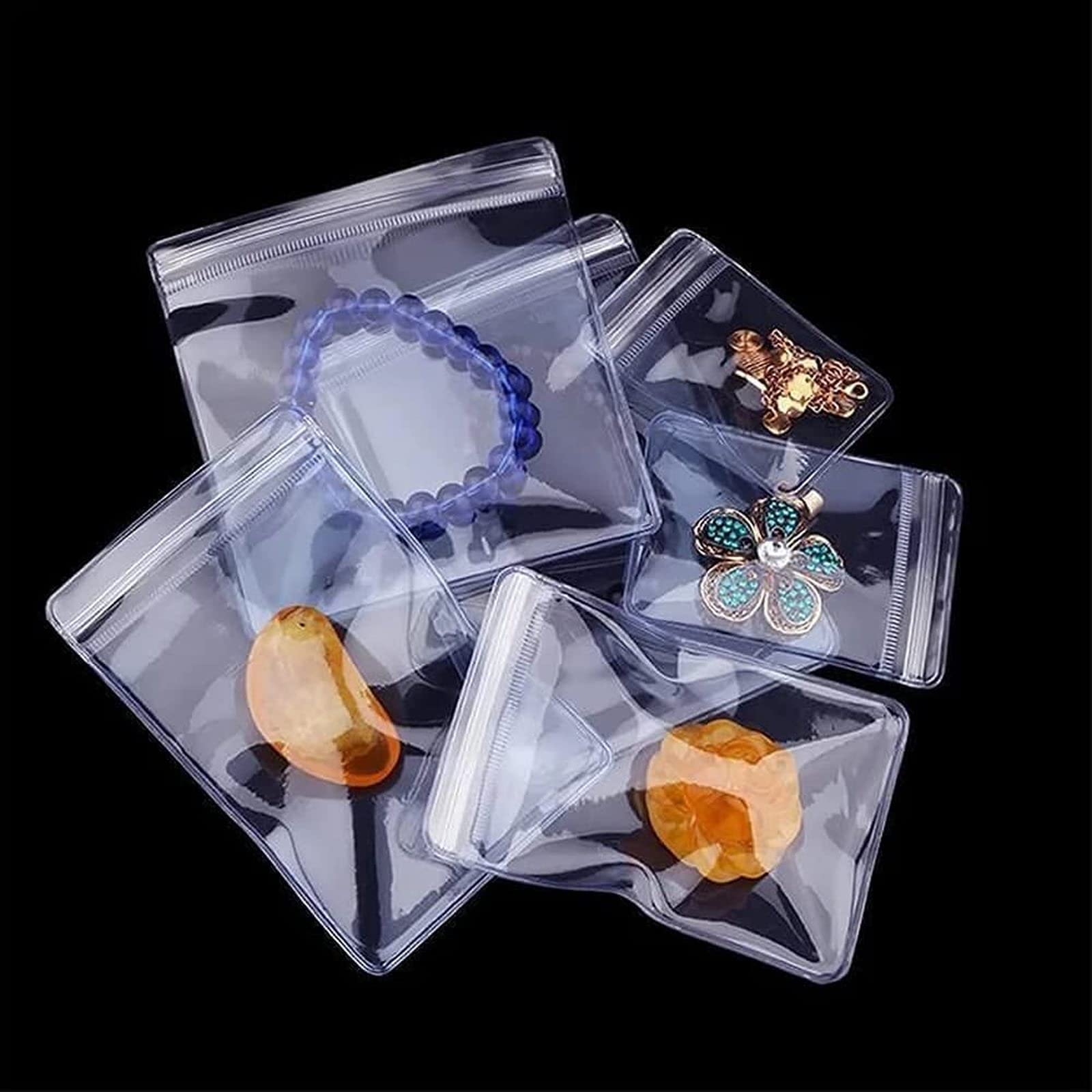 ZZHFC Upgraded Transparent Jewelry Storage Book - Jewelry Travel Organizer with 50 Ziplock Bags | Anti-Tarnish & Anti-Oxidation Jewelry Case for Necklaces, Rings & Earrings | Perfect for Travel, Home Storage & Gift Giving