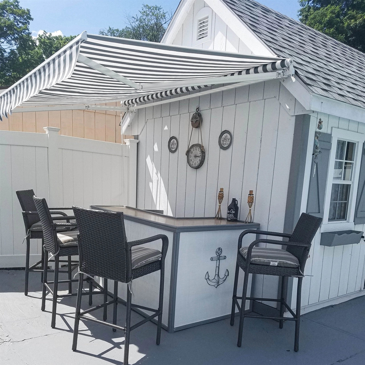 Aleko 16x10 Feet Motorized Retractable Patio Awning - White Frame with Gray & White Stripes for Outdoor Shade & Backyard Relaxation