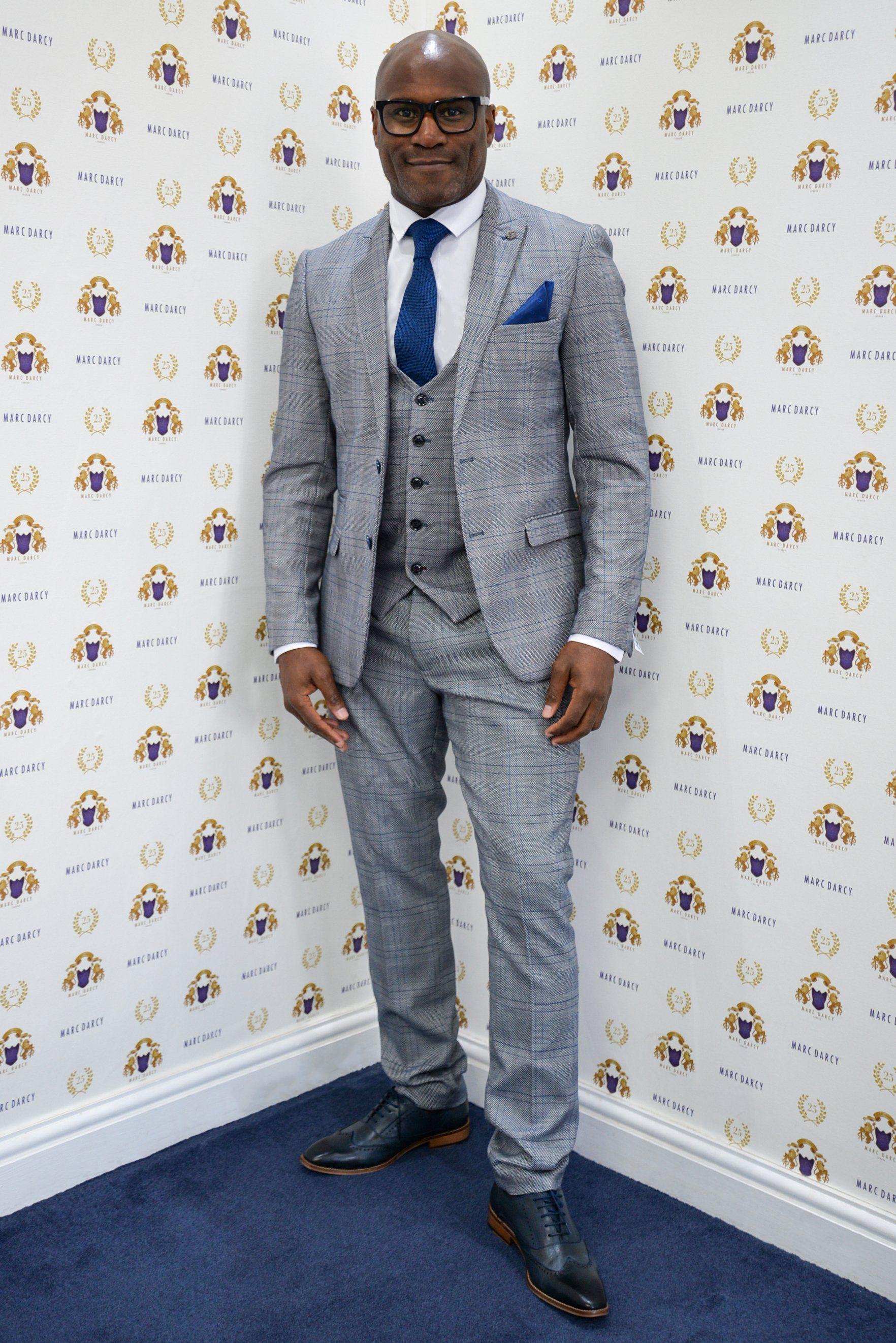 Former Chelsea Footballer Frank Sinclair in Jerry Grey Check Suit - Vintage Football Memorabilia for Collectors & Fans - Perfect for Sports Themed Parties & Man Cave Decor